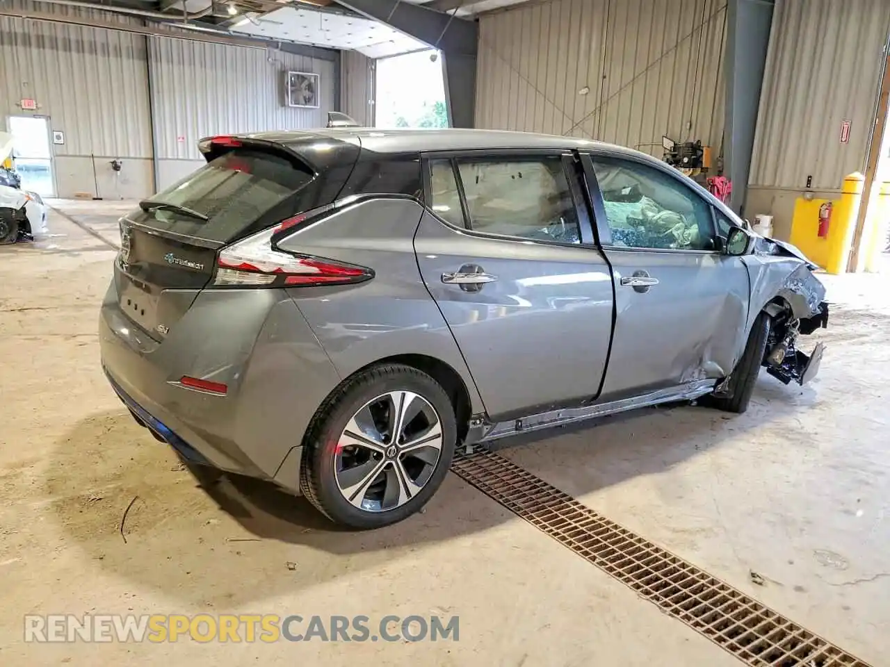 3 fotografías del automóvil dañado 1N4AZ1CV8MC553707 NISSAN LEAF 2021
