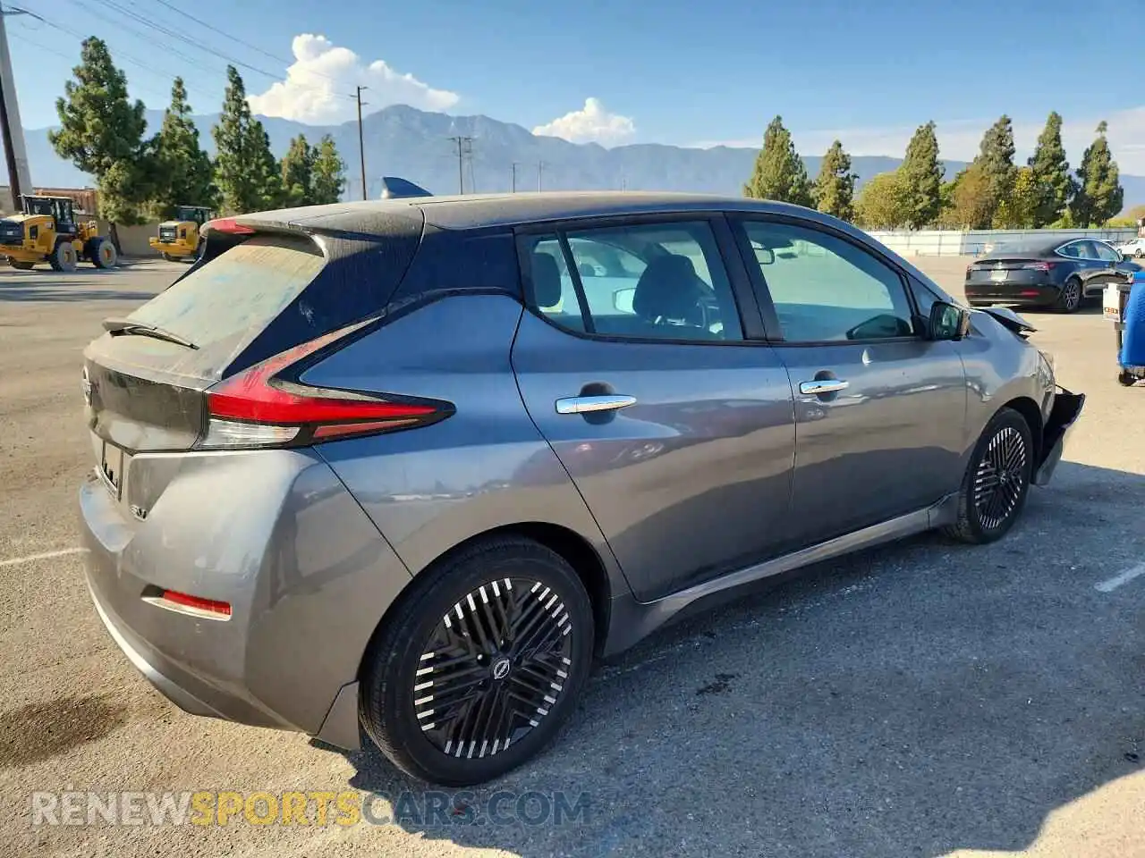 3 fotografías del automóvil dañado 1N4CZ1CV0PC561541 NISSAN LEAF 2023