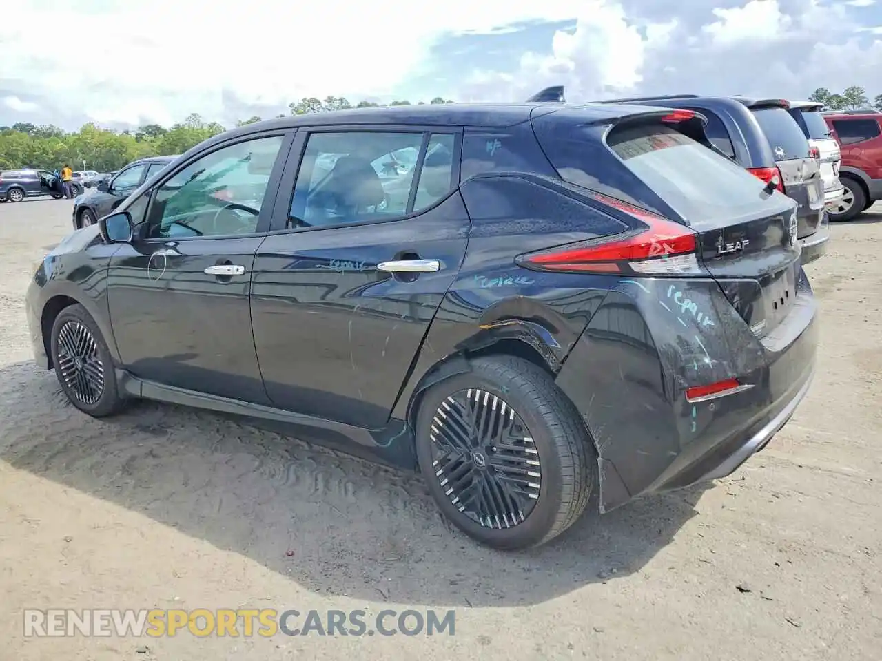 2 fotografías del automóvil dañado 1N4CZ1CV4PC562188 NISSAN LEAF 2023