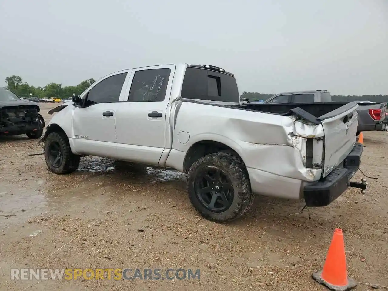 2 fotografías del automóvil dañado 1N6AA1ECXLN510029 NISSAN TITAN 2020