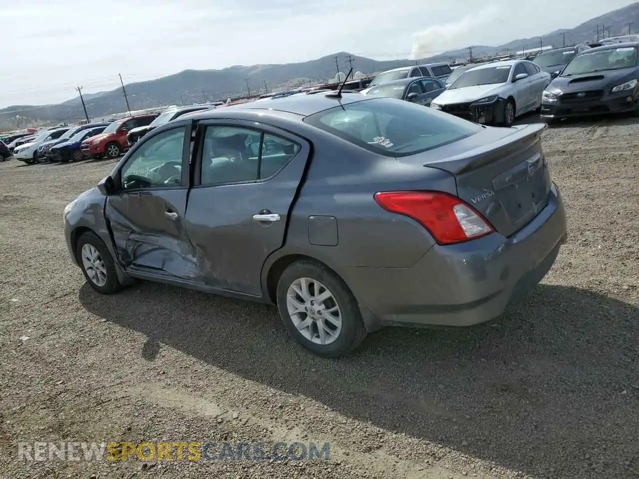 2 Photograph of a damaged car 3N1CN7AP6KL818697 NISSAN VERSA 2019