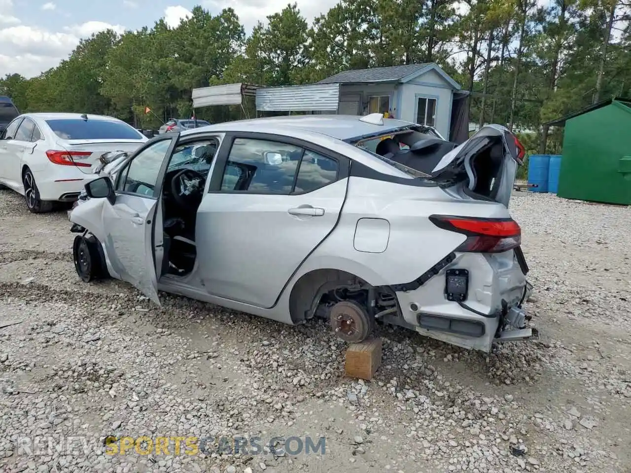 2 fotografías del automóvil dañado 3N1CN8EV0ML881229 NISSAN VERSA 2021