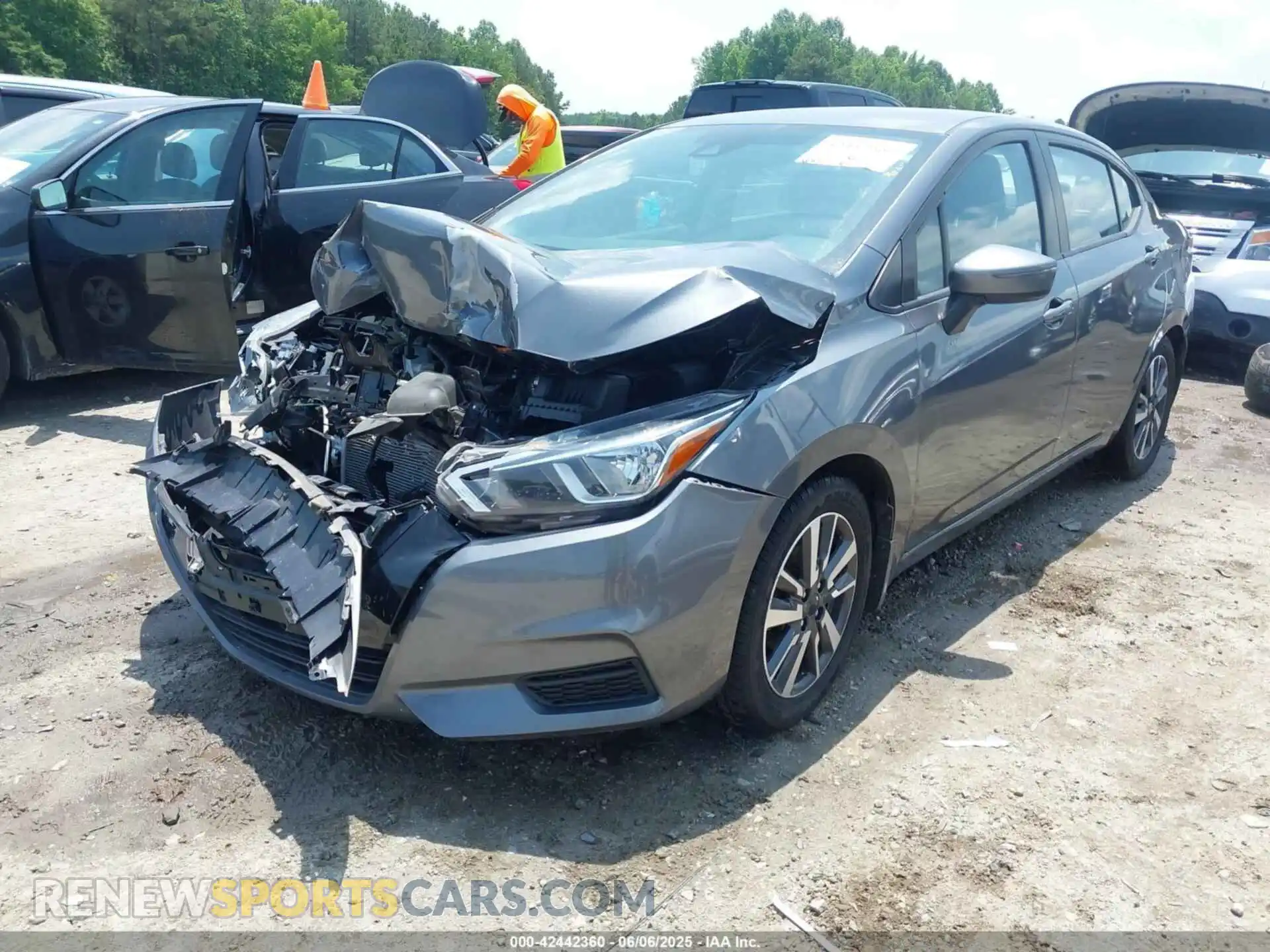 2 fotografías del automóvil dañado 3N1CN8EV4ML860108 NISSAN VERSA 2021