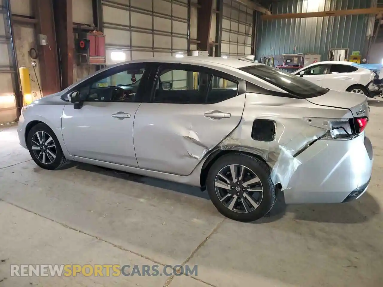 2 fotografías del automóvil dañado 3N1CN8EV6ML876780 NISSAN VERSA 2021