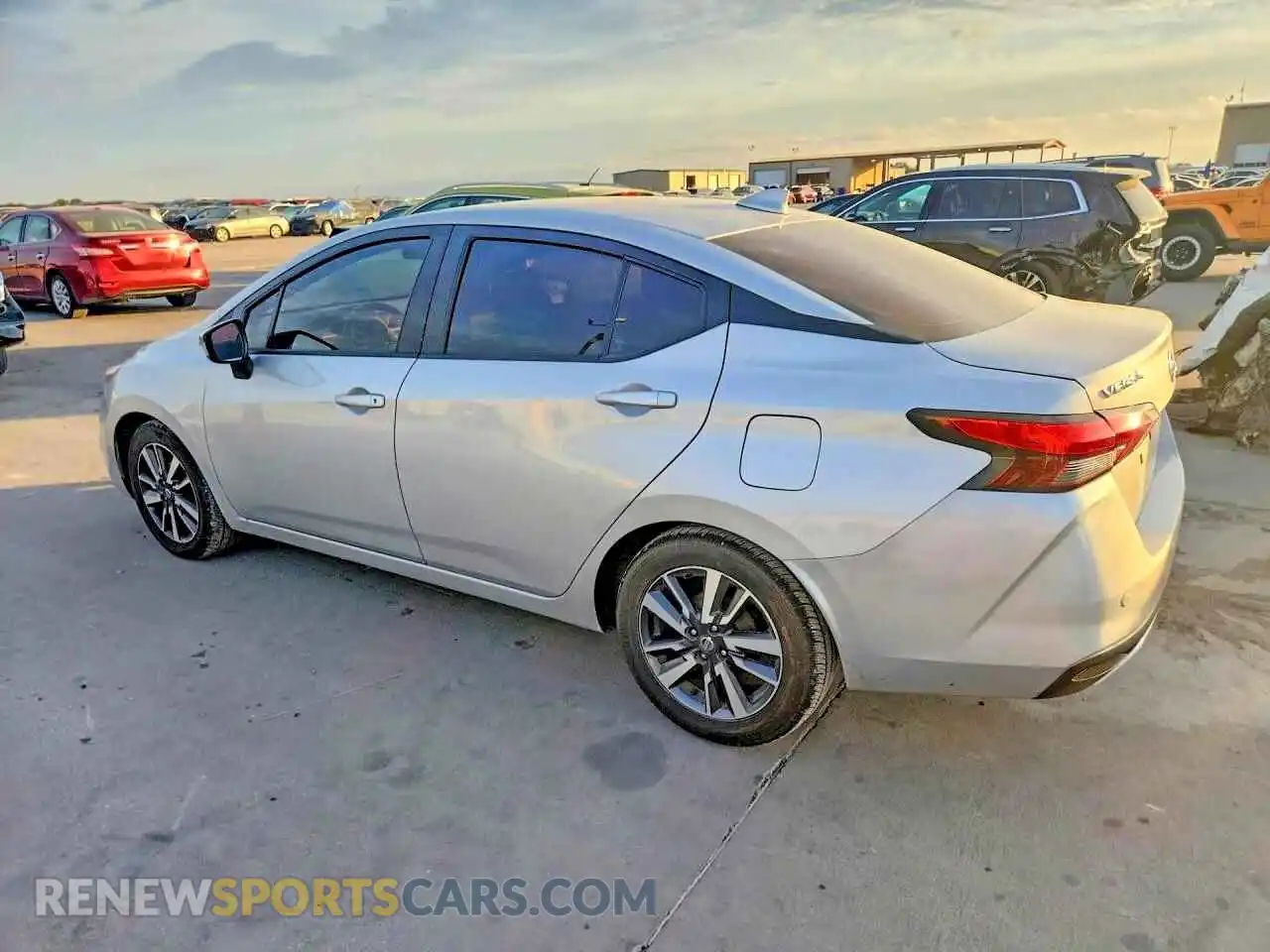 2 fotografías del automóvil dañado 3N1CN8EV8ML832103 NISSAN VERSA 2021