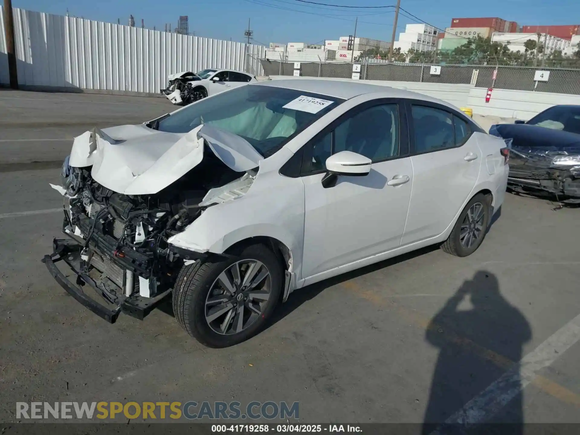 2 fotografías del automóvil dañado 3N1CN8EV8ML920326 NISSAN VERSA 2021