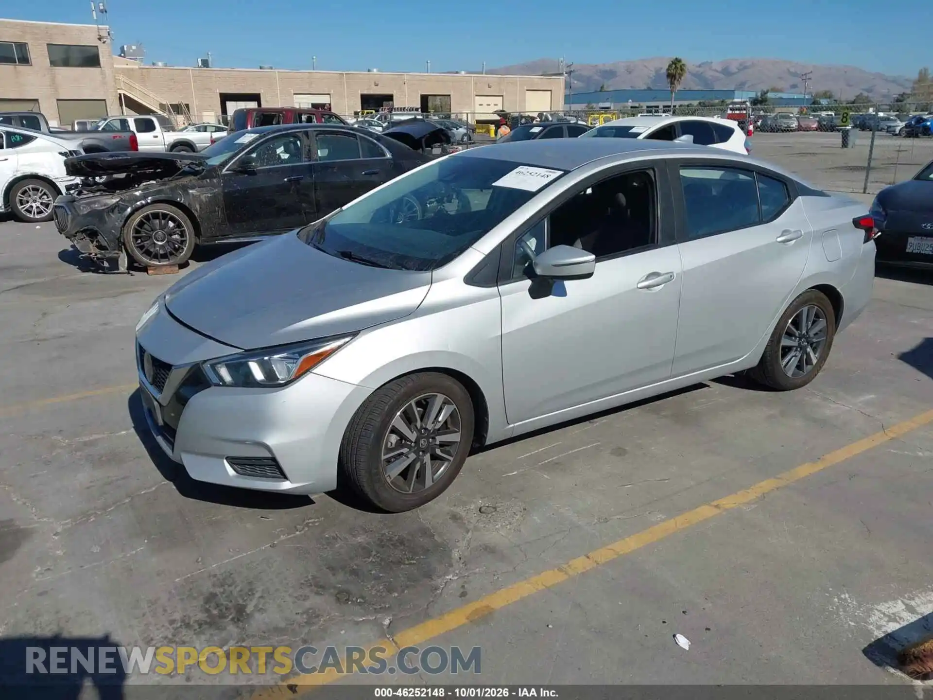 2 fotografías del automóvil dañado 3N1CN8EV9ML892410 NISSAN VERSA 2021
