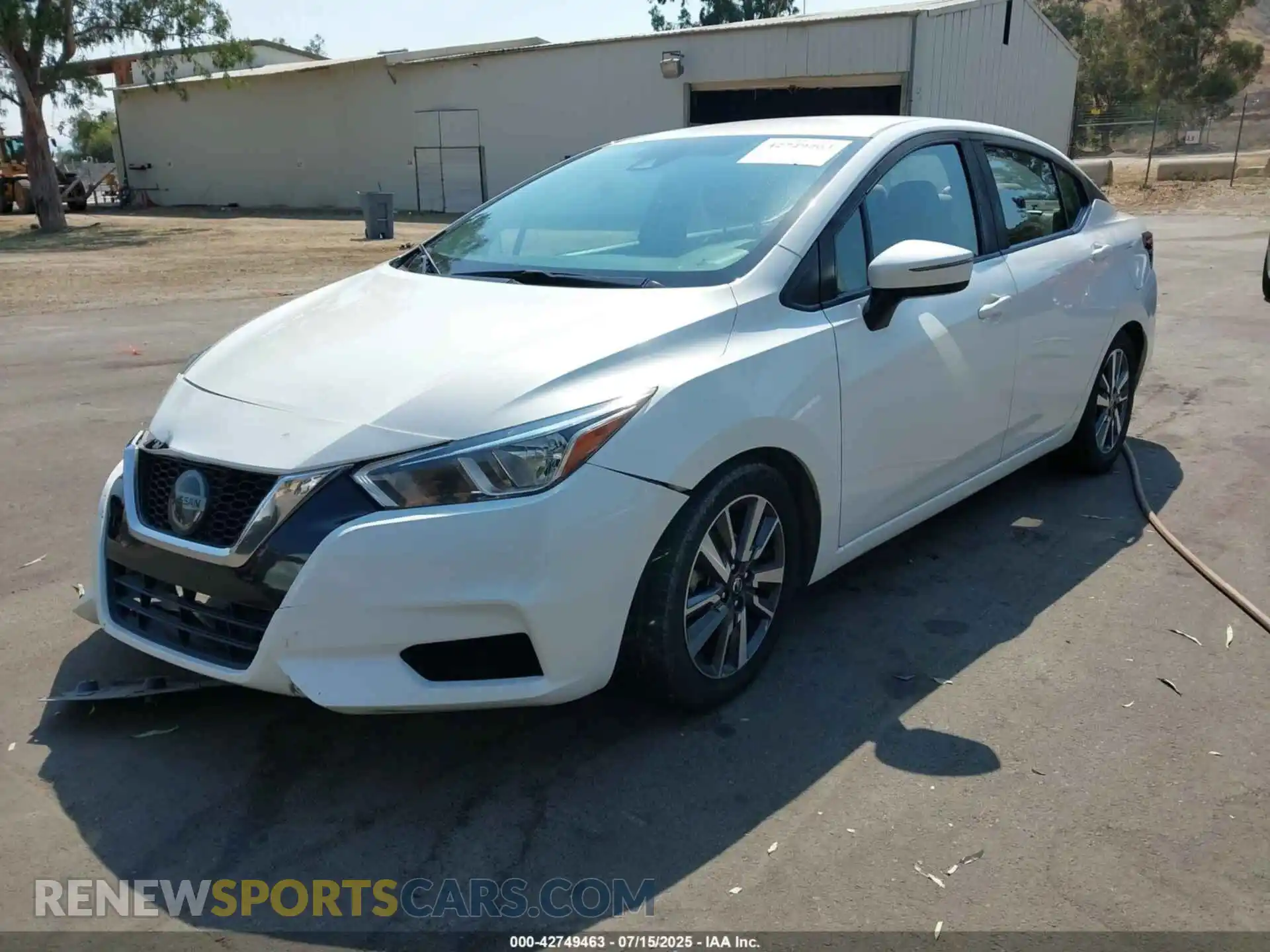 2 fotografías del automóvil dañado 3N1CN8EVXML868973 NISSAN VERSA 2021