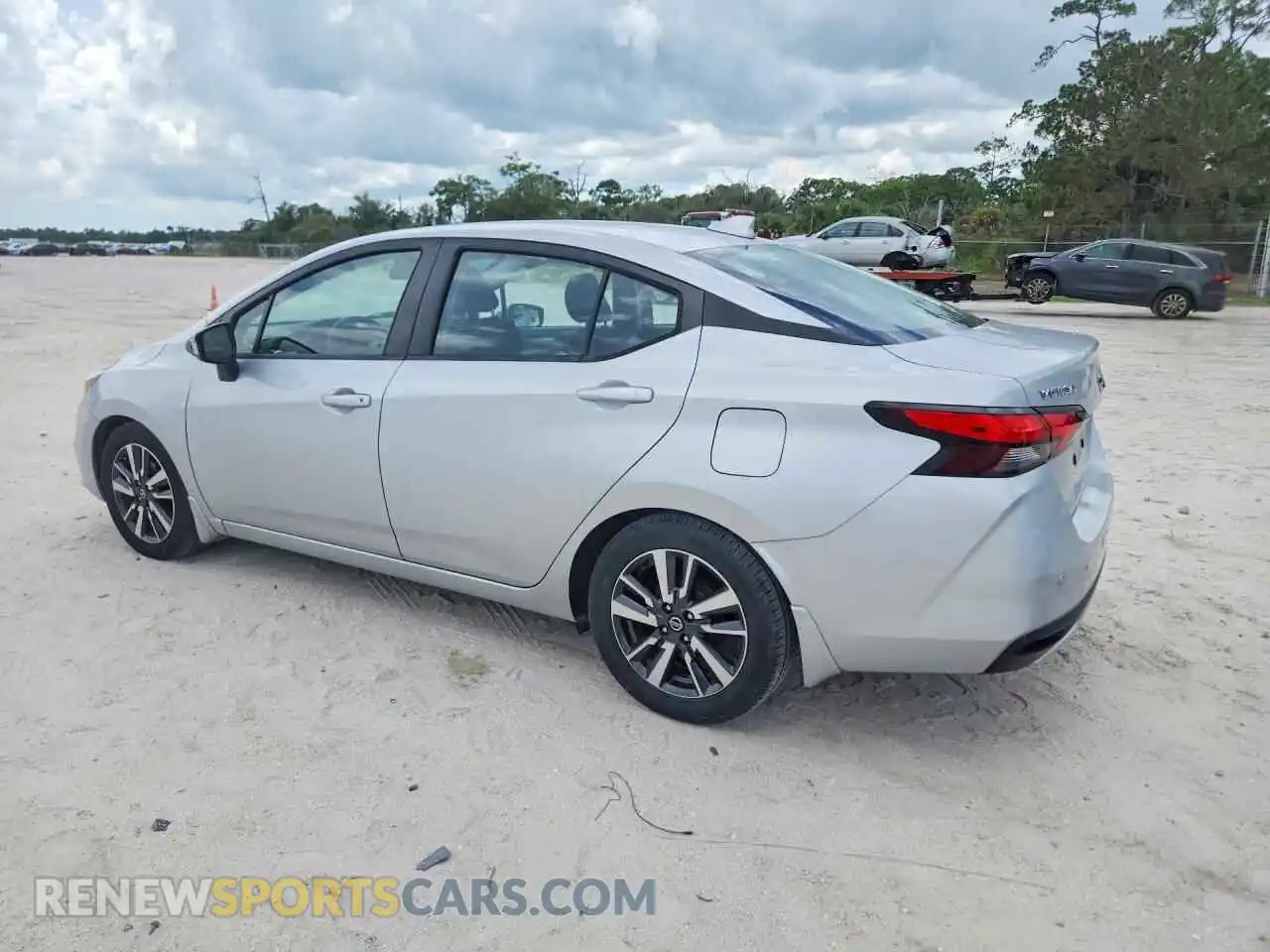 2 fotografías del automóvil dañado 3N1CN8EVXML889404 NISSAN VERSA 2021