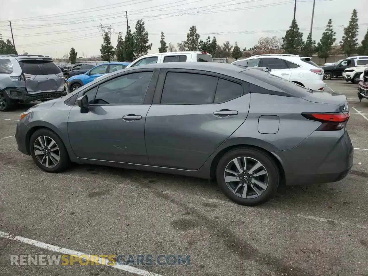 2 fotografías del automóvil dañado 3N1CN8EVXML892092 NISSAN VERSA 2021