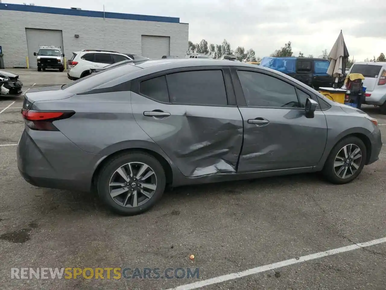 3 fotografías del automóvil dañado 3N1CN8EVXML892092 NISSAN VERSA 2021
