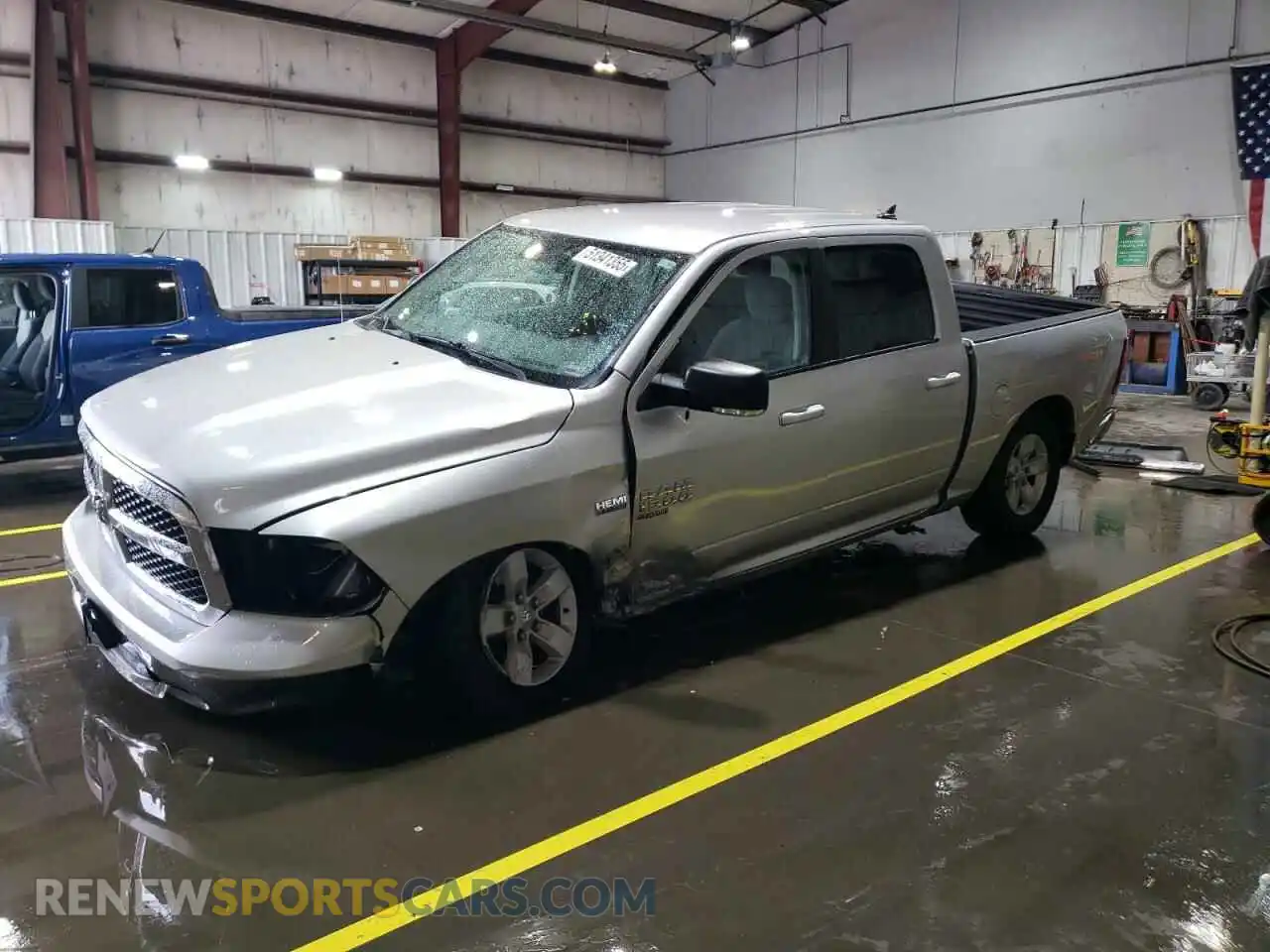 1 Photograph of a damaged car 1C6RR6LT0KS549041 RAM 1500 2019
