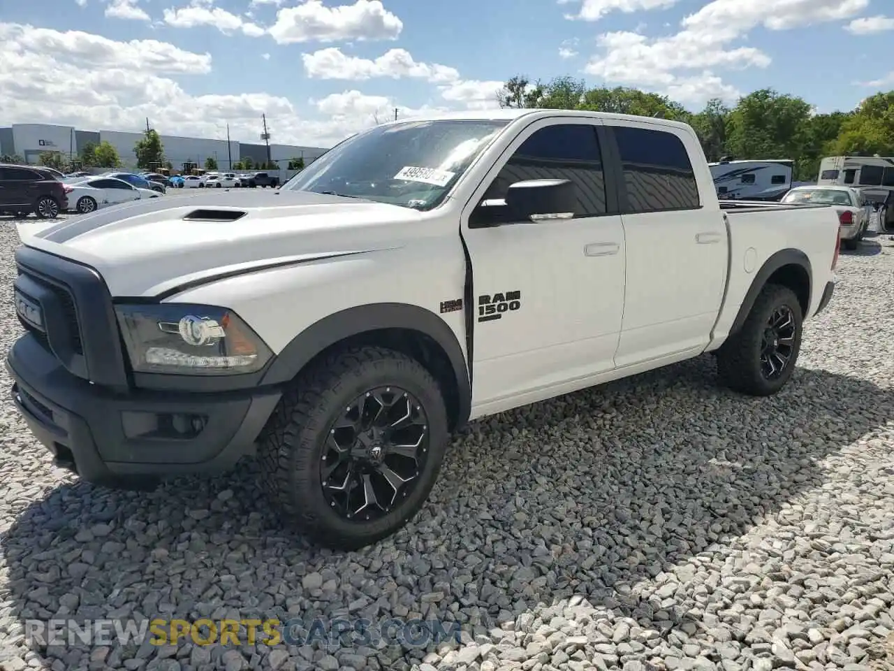 1 Photograph of a damaged car 1C6RR6LT3KS661509 RAM 1500 2019