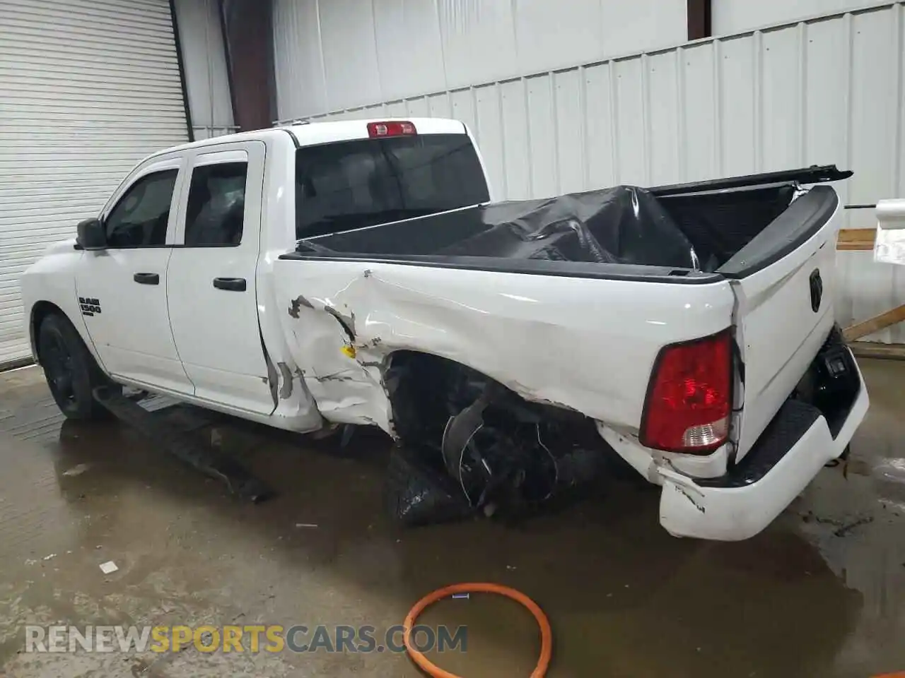 2 Photograph of a damaged car 1C6RR7FG3KS706159 RAM 1500 2019