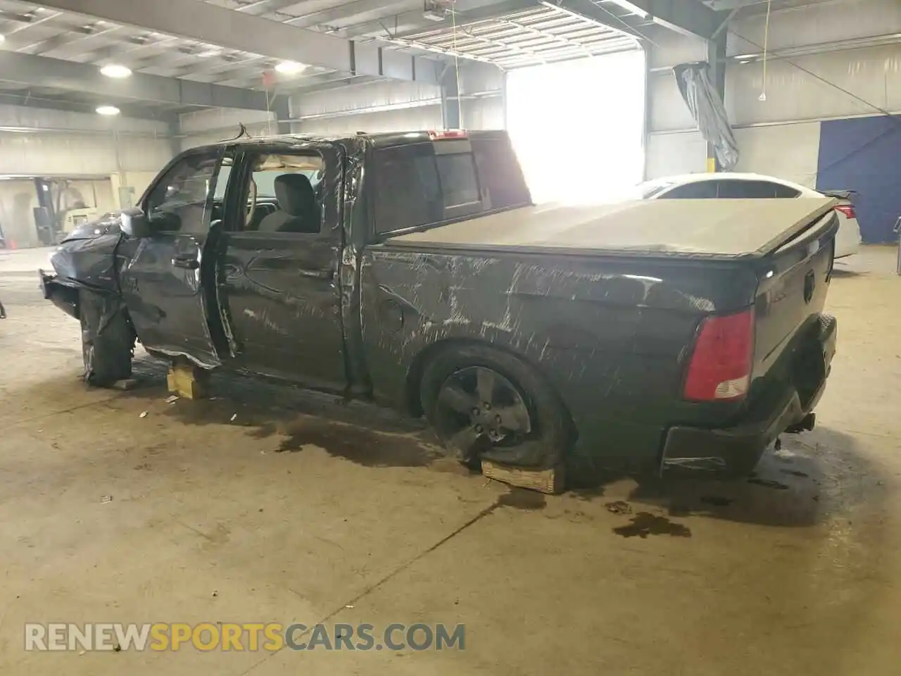 2 Photograph of a damaged car 1C6RR7LT0KS569845 RAM 1500 2019
