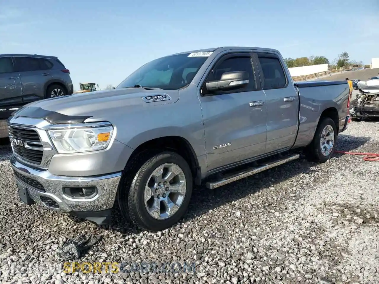 1 Photograph of a damaged car 1C6RREBTXKN884012 RAM 1500 2019