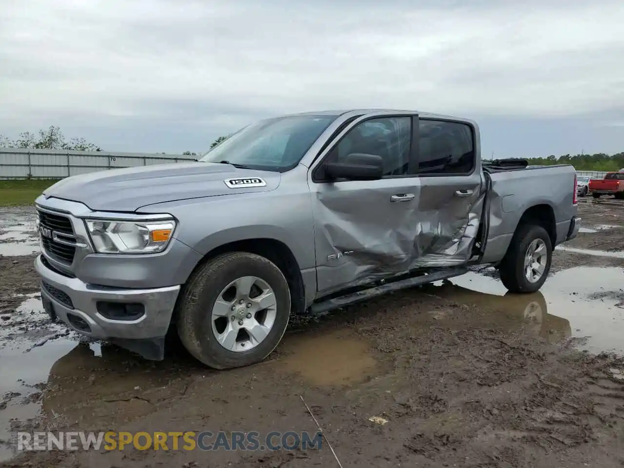 1 Photograph of a damaged car 1C6RREFG0KN751353 RAM 1500 2019