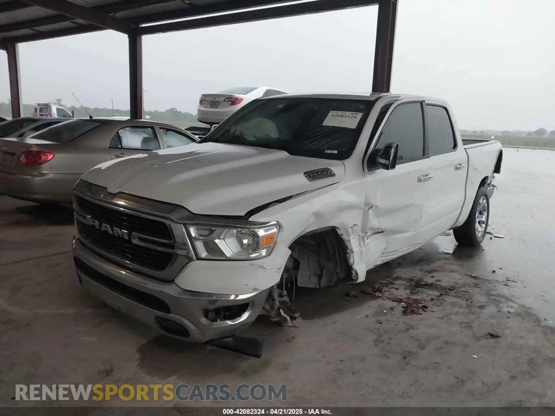 2 fotografías del automóvil dañado 1C6RREFT0KN604351 RAM 1500 2019