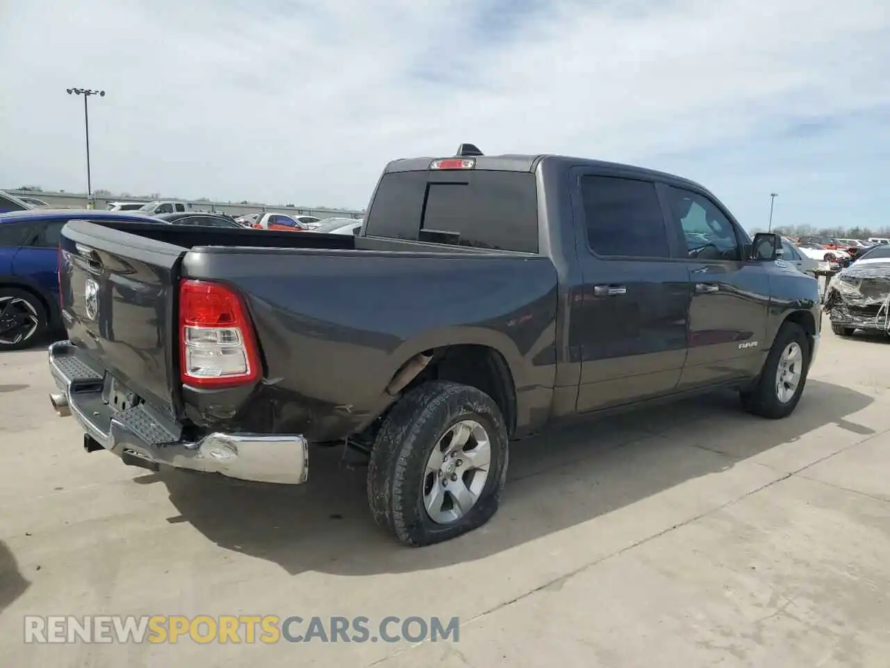 3 Photograph of a damaged car 1C6RREFT0KN745503 RAM 1500 2019
