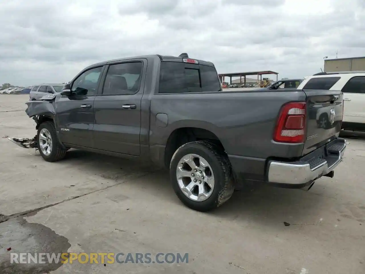 2 Photograph of a damaged car 1C6RREFT1KN523200 RAM 1500 2019