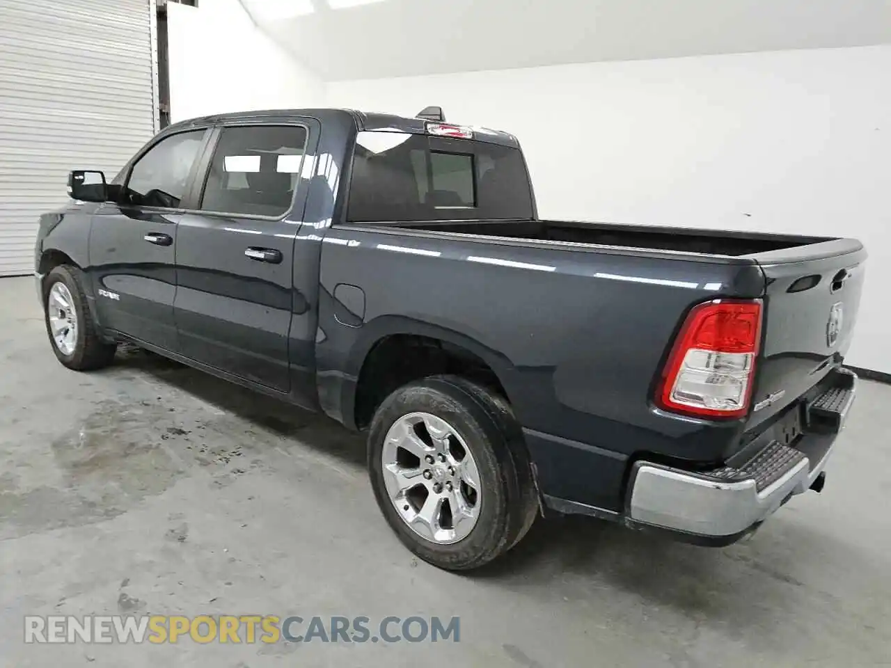 2 Photograph of a damaged car 1C6RREFT2KN706234 RAM 1500 2019
