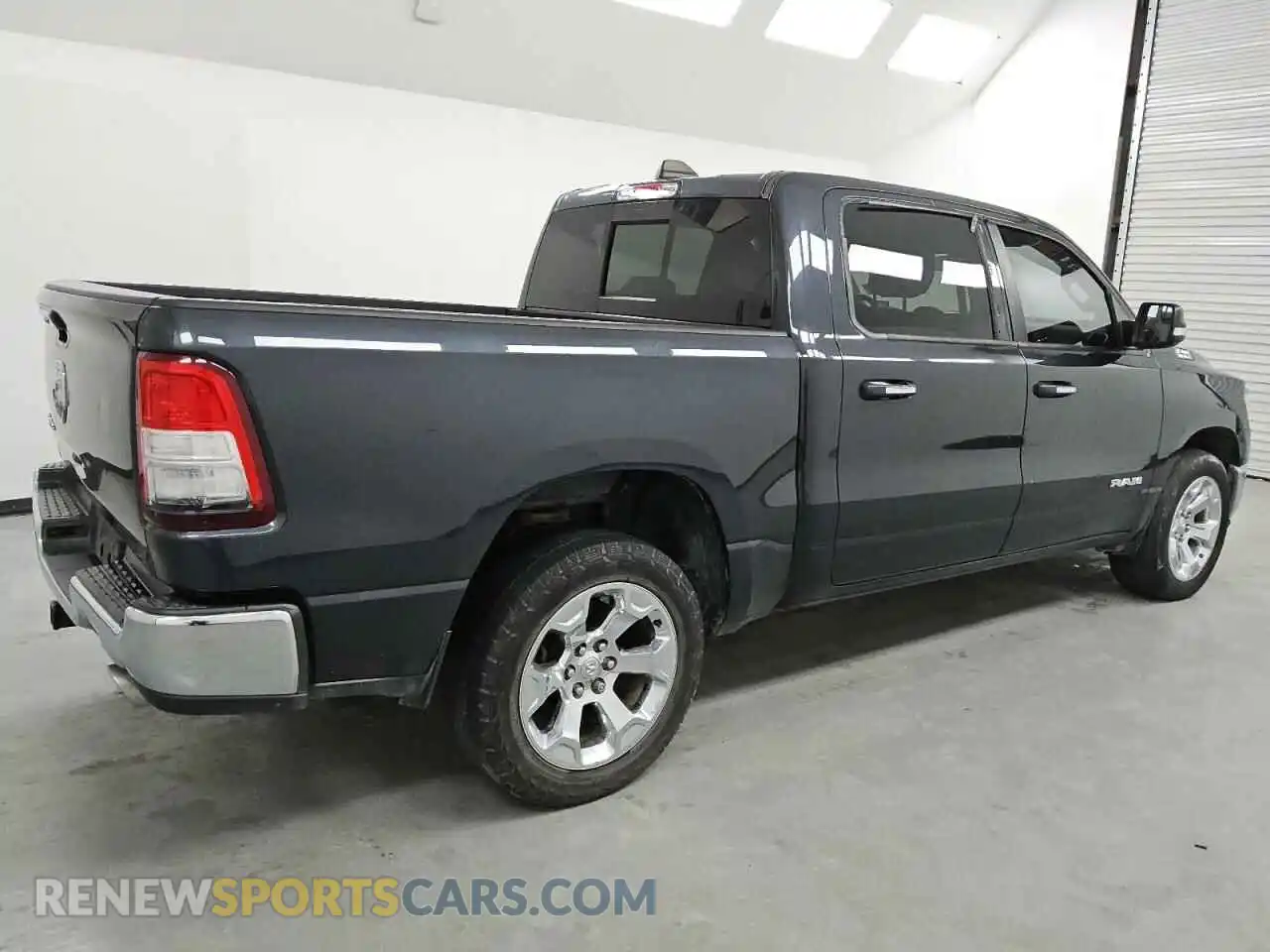 3 Photograph of a damaged car 1C6RREFT2KN706234 RAM 1500 2019