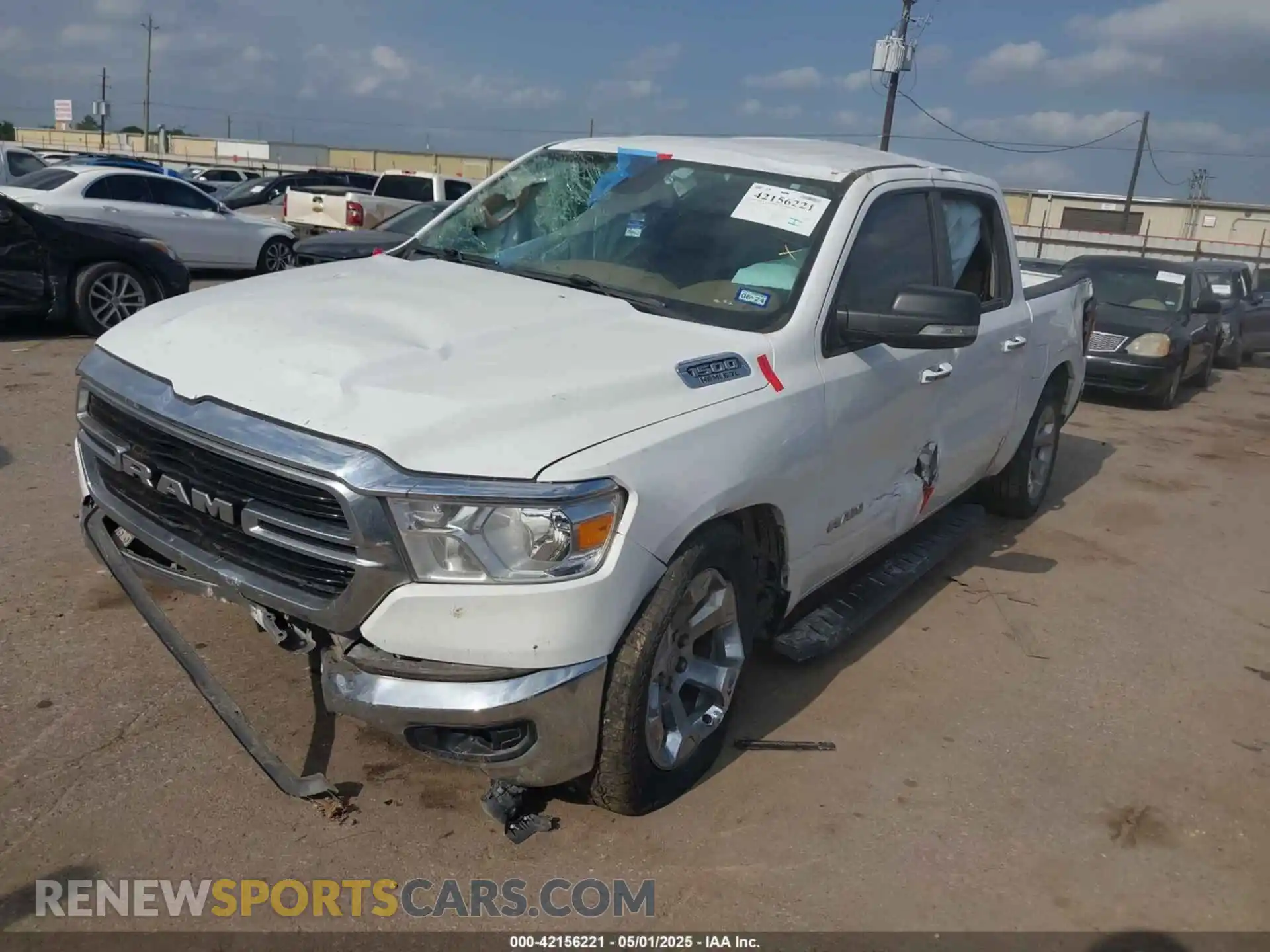 2 Photograph of a damaged car 1C6RREFT5KN596490 RAM 1500 2019