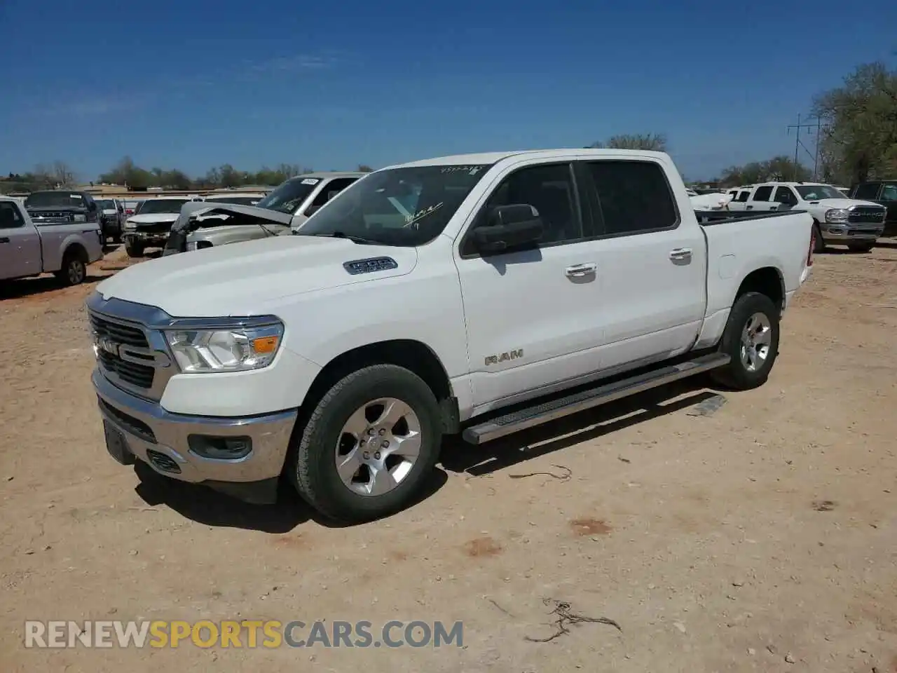 1 Photograph of a damaged car 1C6RREFT5KN660897 RAM 1500 2019