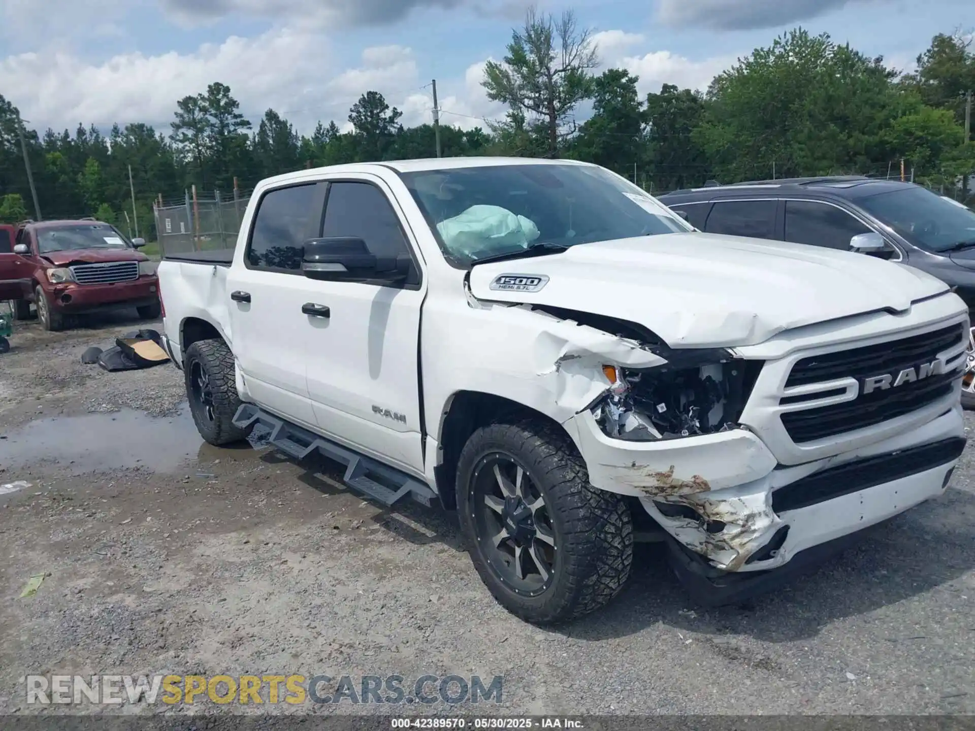 1 Photograph of a damaged car 1C6RREFT5KN869489 RAM 1500 2019