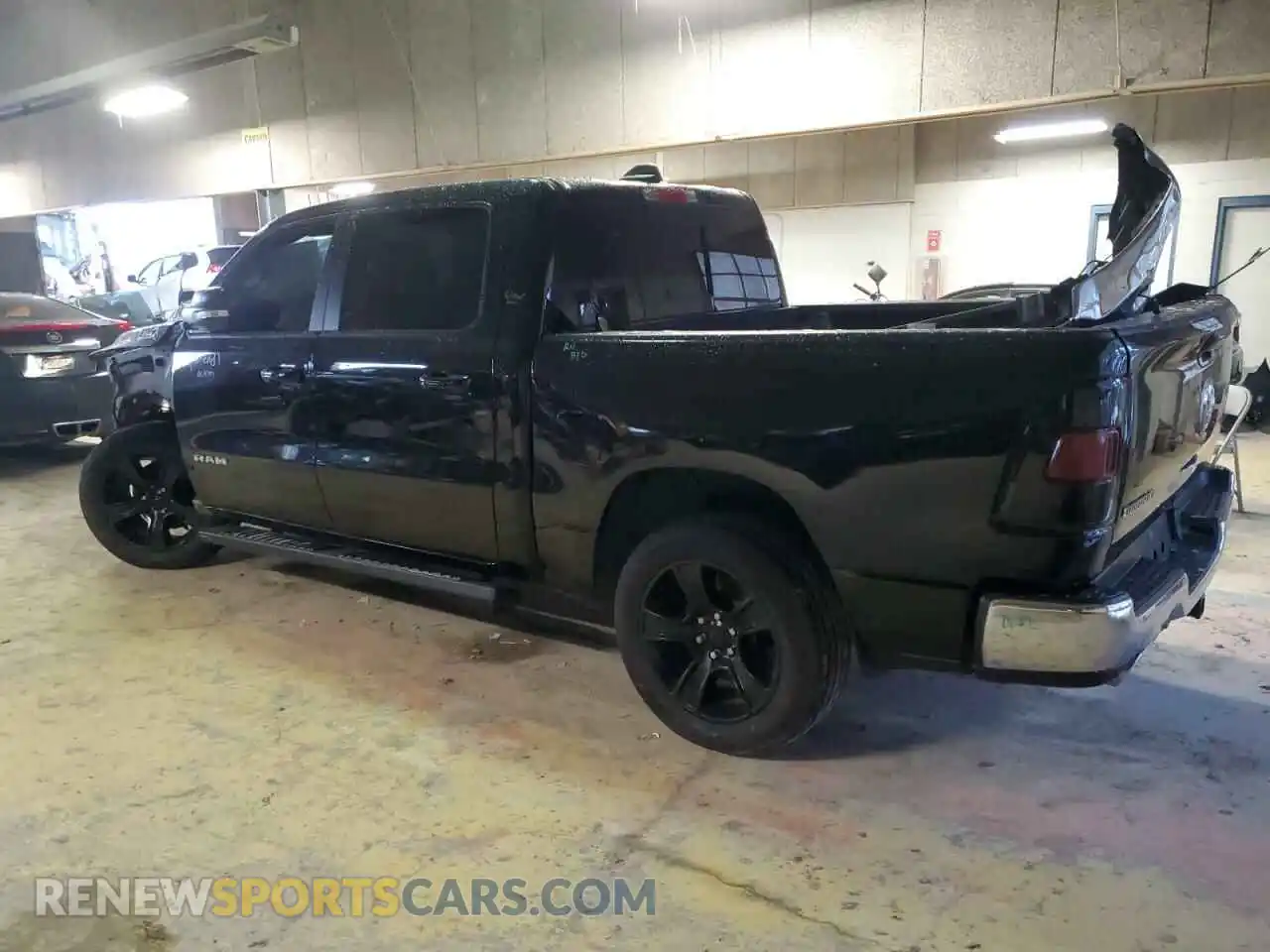 2 Photograph of a damaged car 1C6RREFT6KN526528 RAM 1500 2019