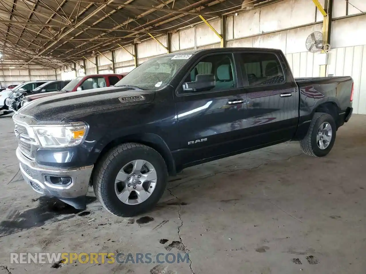 1 Photograph of a damaged car 1C6RREFT6KN769823 RAM 1500 2019