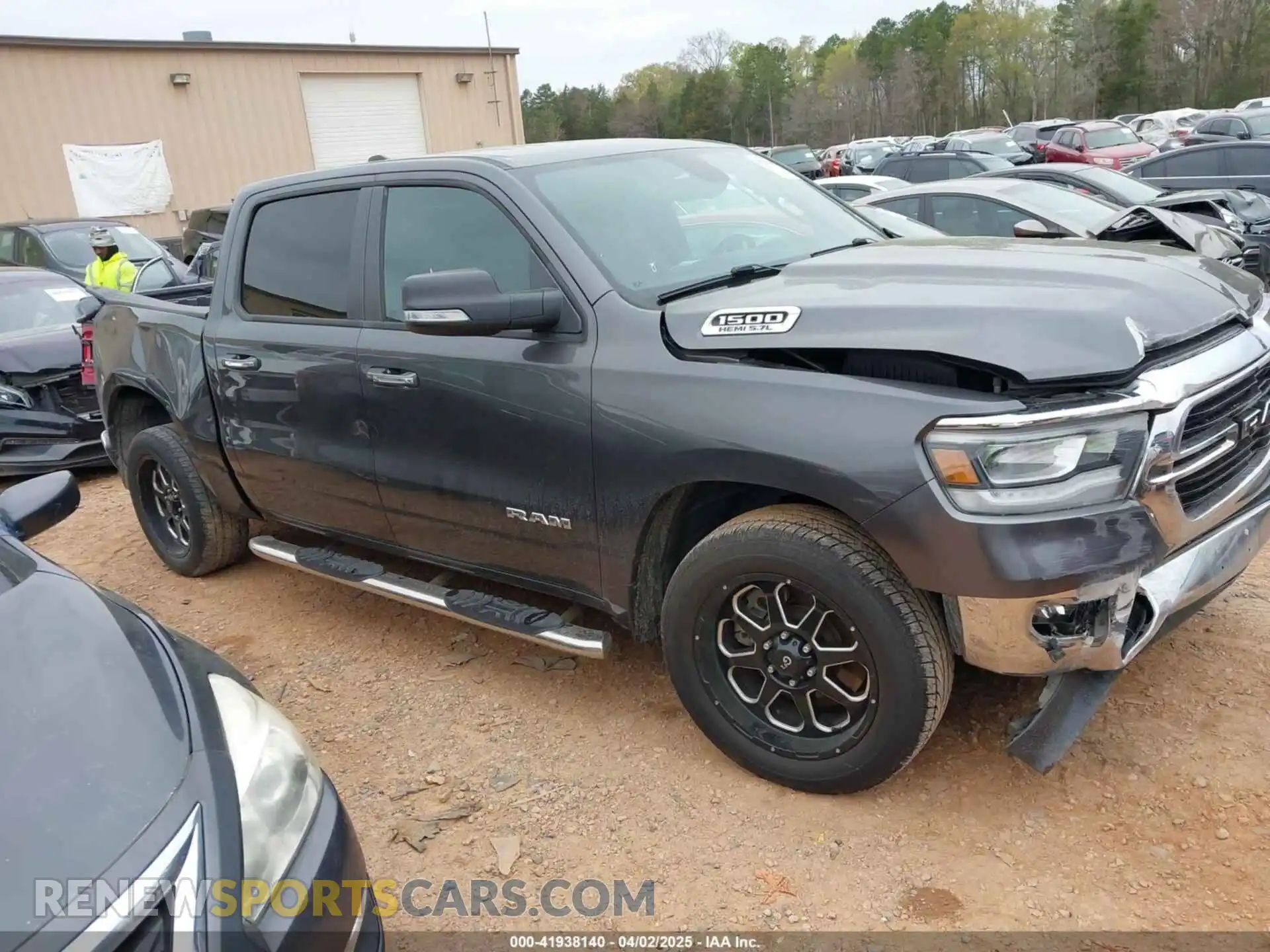 1 Photograph of a damaged car 1C6RREFT7KN522858 RAM 1500 2019