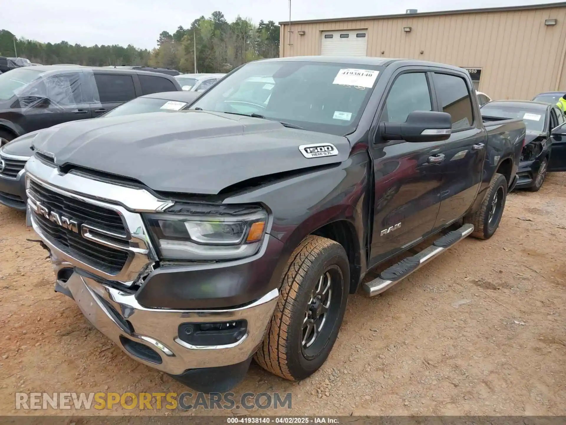 2 Photograph of a damaged car 1C6RREFT7KN522858 RAM 1500 2019