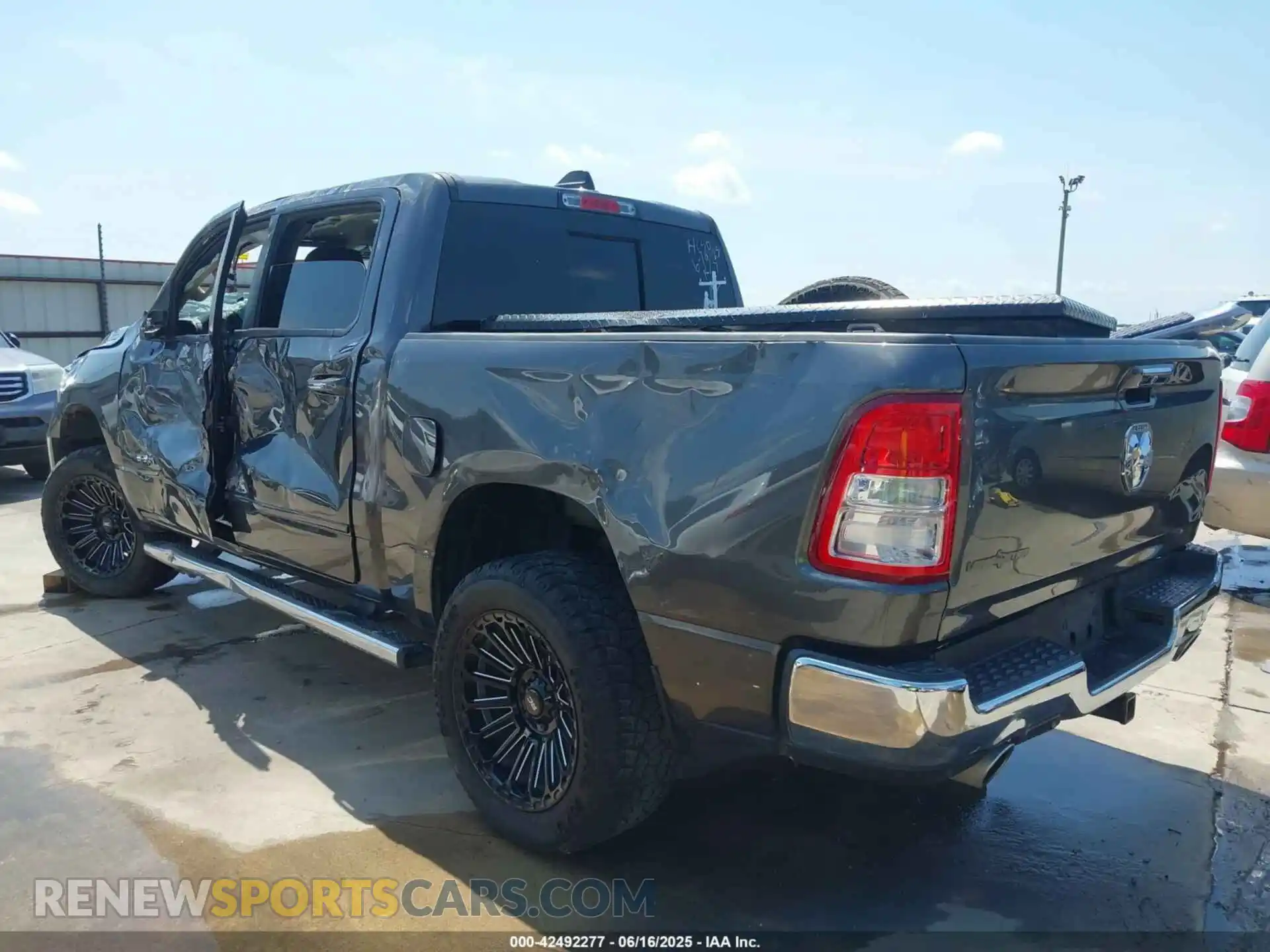 3 Photograph of a damaged car 1C6RREFT8KN567890 RAM 1500 2019