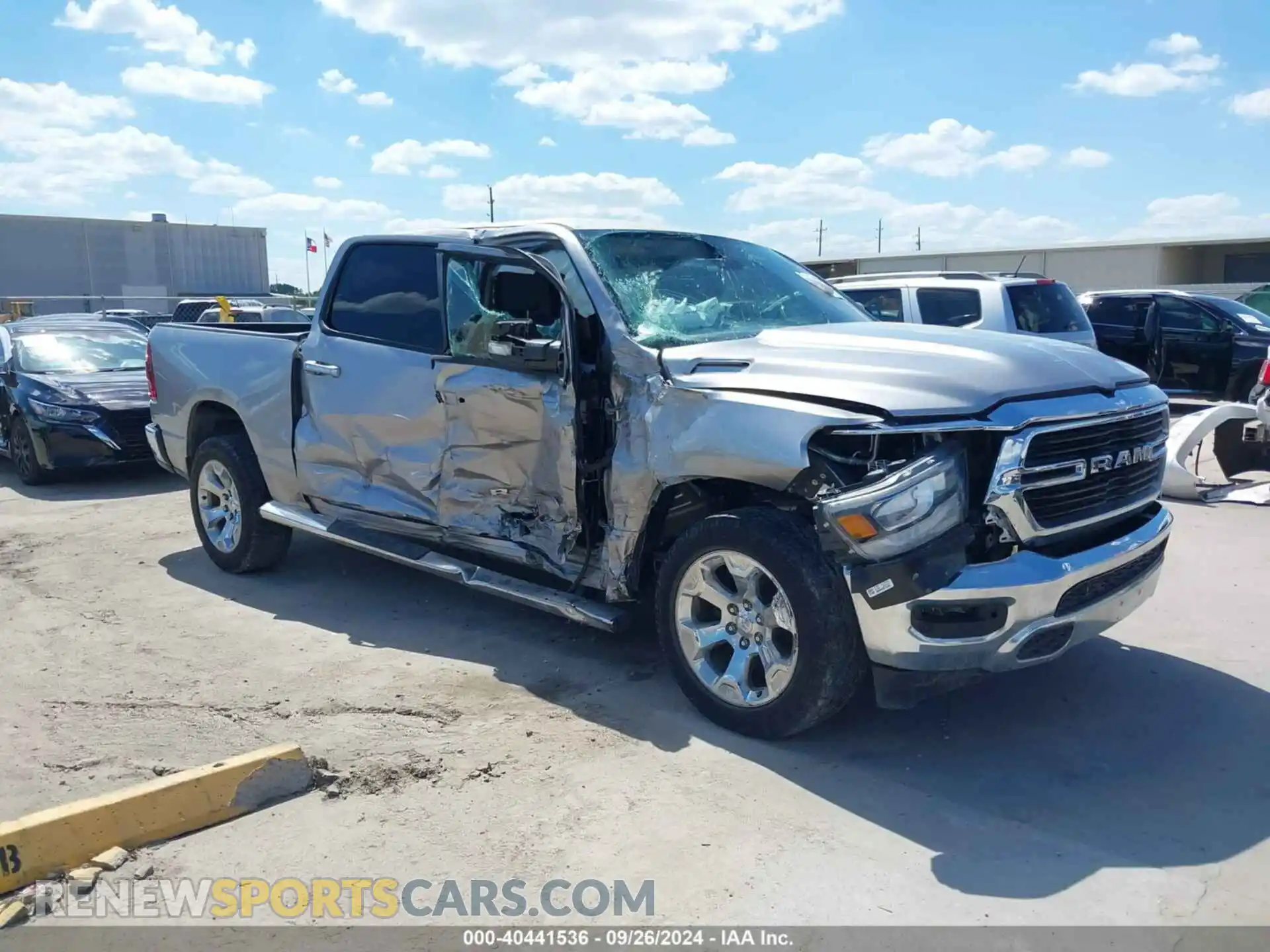 1 Photograph of a damaged car 1C6RREFT8KN769323 RAM 1500 2019
