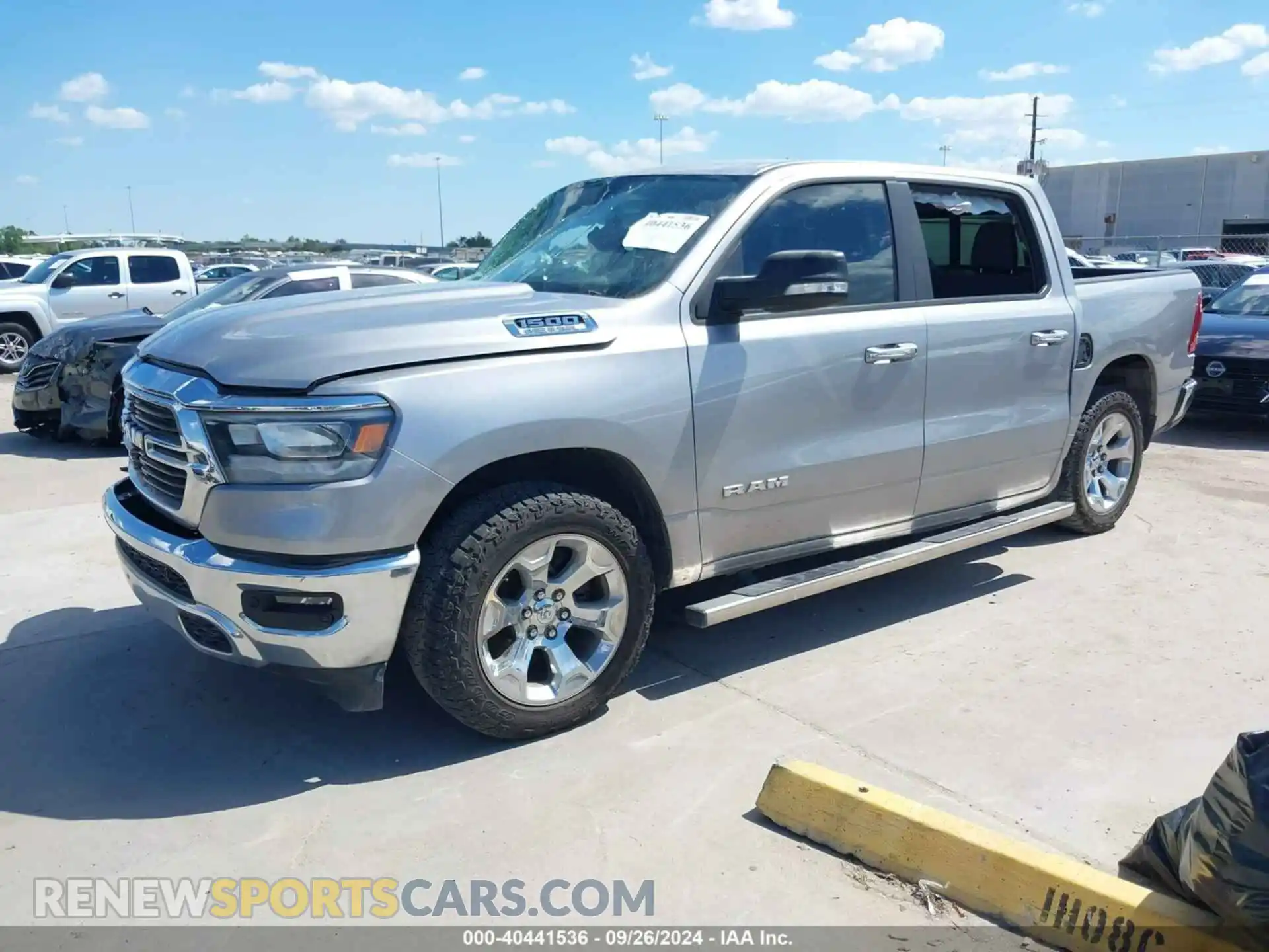 2 Photograph of a damaged car 1C6RREFT8KN769323 RAM 1500 2019