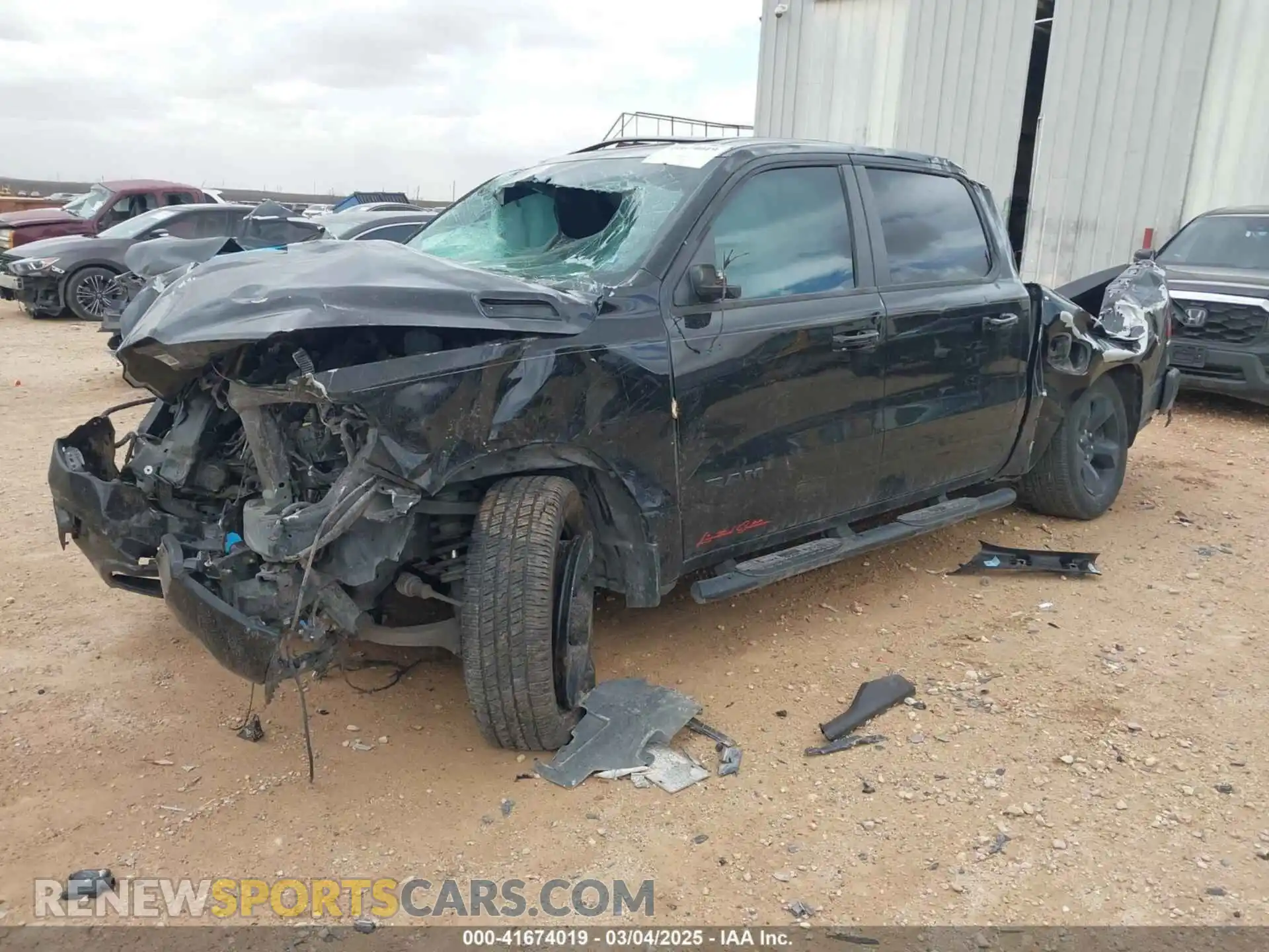 2 Photograph of a damaged car 1C6RREFTXKN518223 RAM 1500 2019