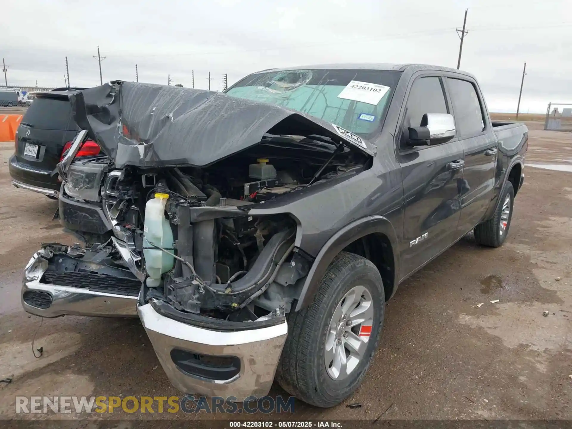2 Photograph of a damaged car 1C6RREJT2KN635625 RAM 1500 2019