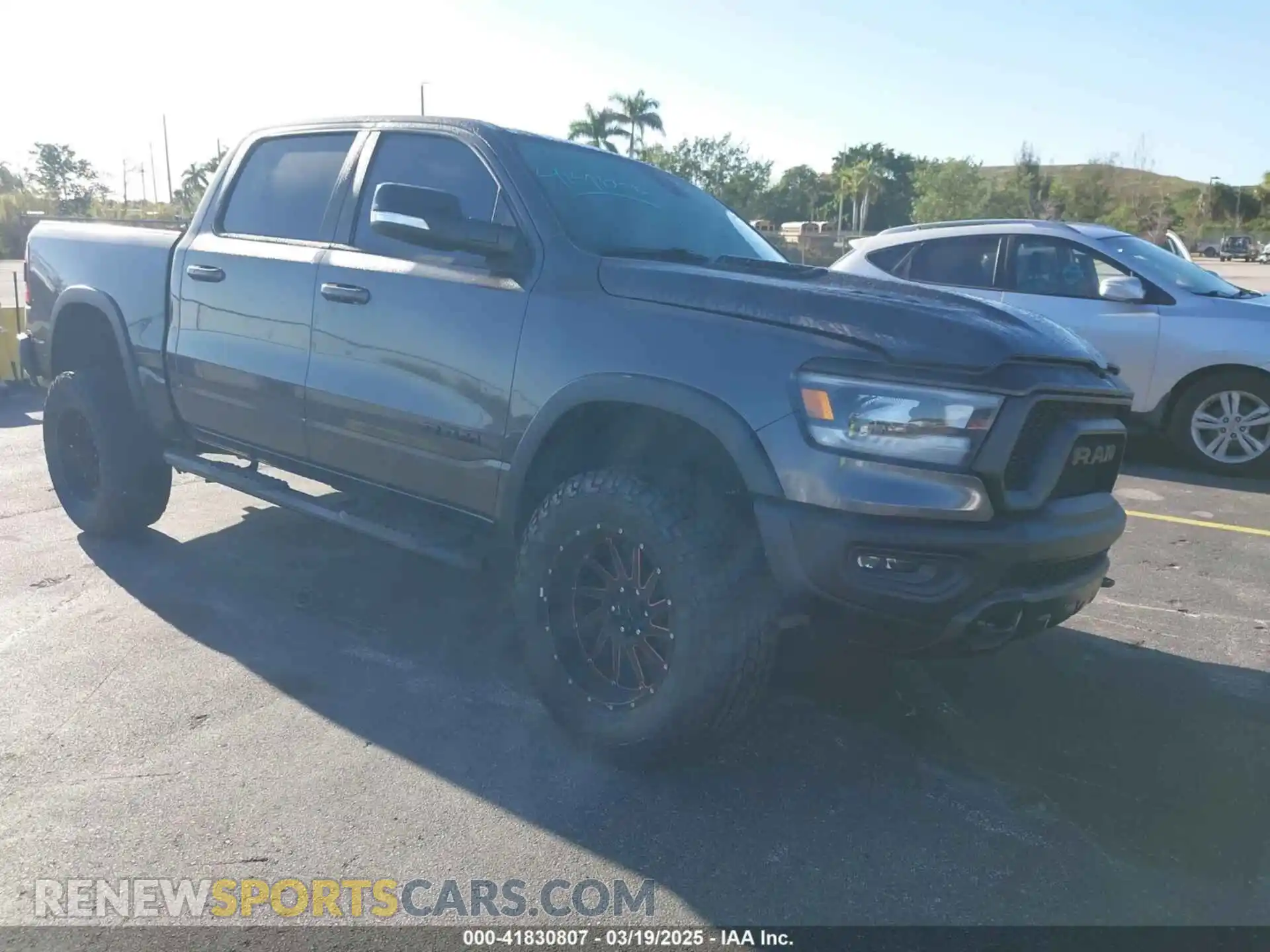 1 Photograph of a damaged car 1C6RRELT8KN549233 RAM 1500 2019