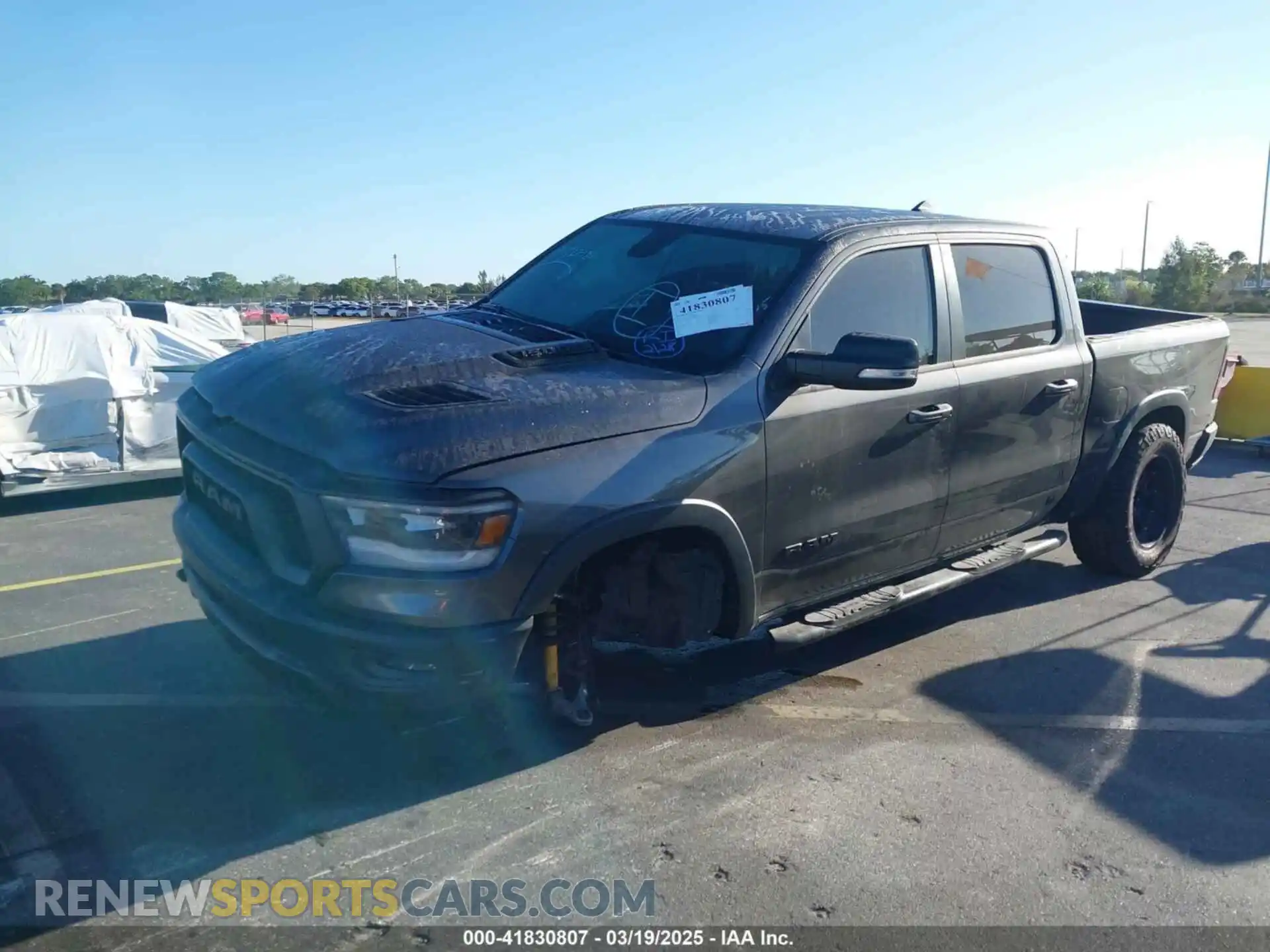 2 Photograph of a damaged car 1C6RRELT8KN549233 RAM 1500 2019
