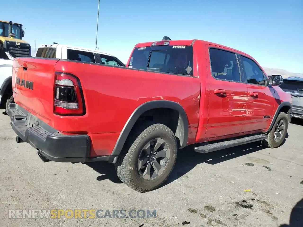 3 fotografías del automóvil dañado 1C6RRELT8KN832943 RAM 1500 2019
