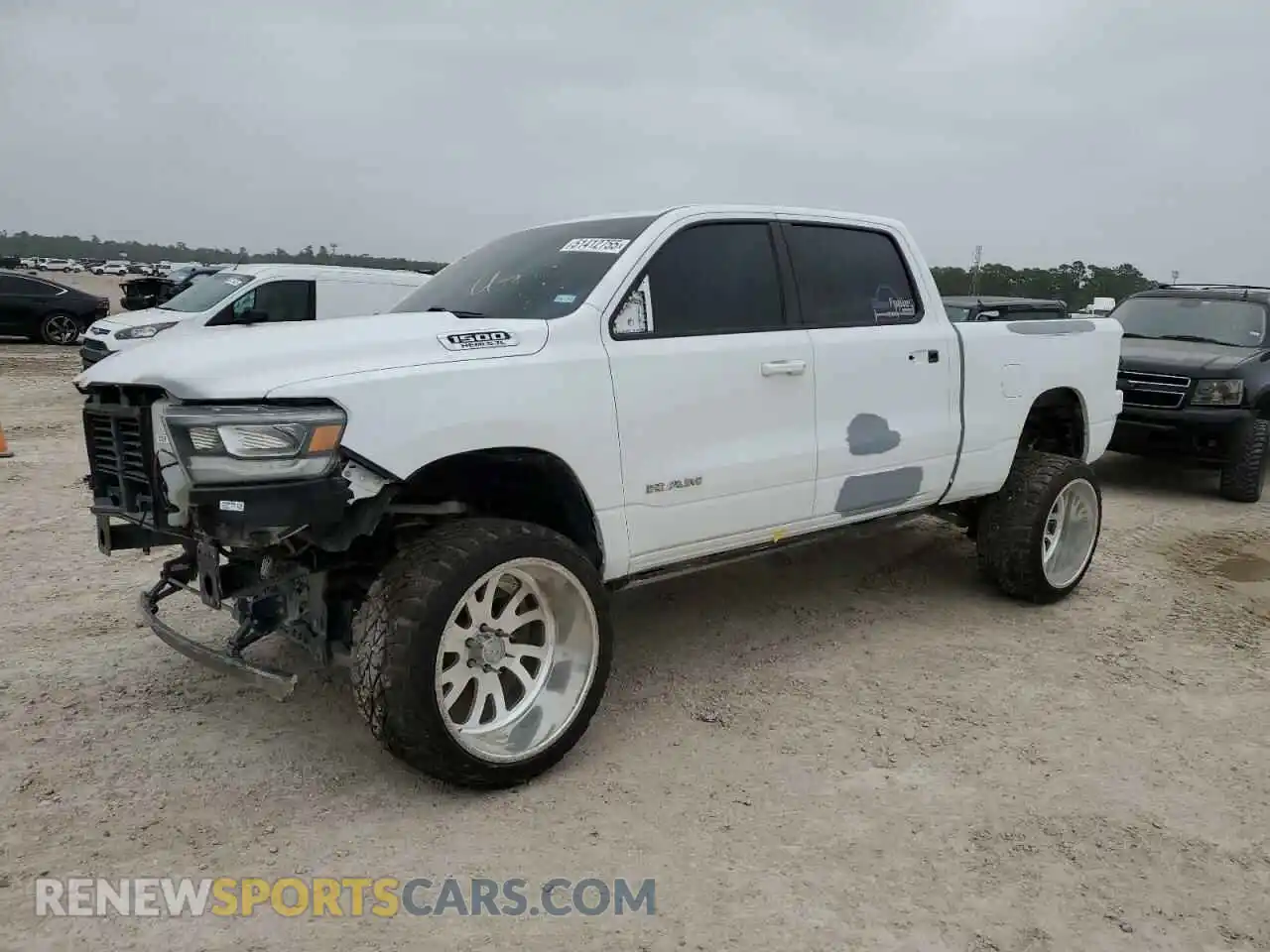 1 Photograph of a damaged car 1C6RREMT6KN683530 RAM 1500 2019