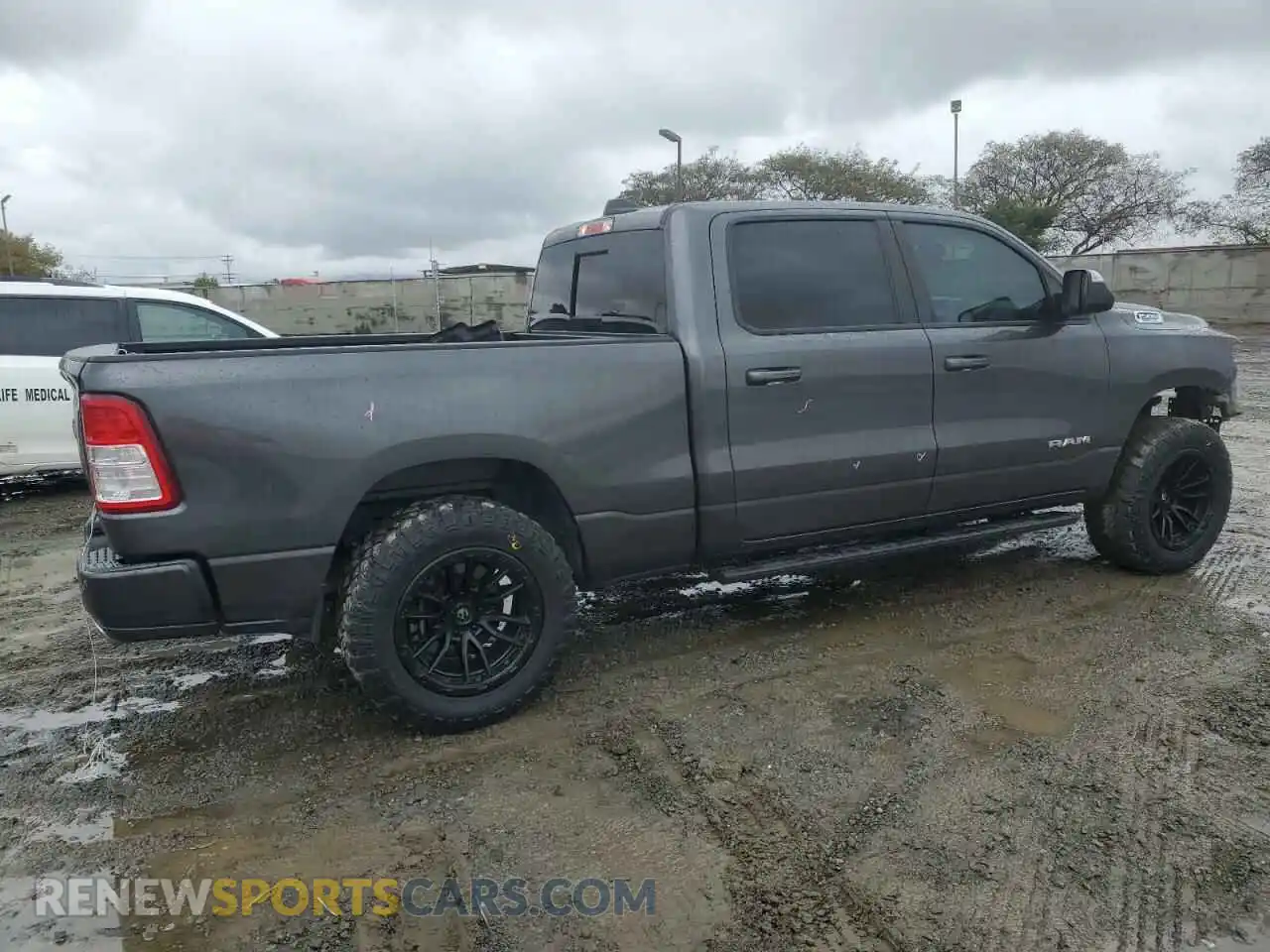 3 Photograph of a damaged car 1C6RREMT6KN735335 RAM 1500 2019