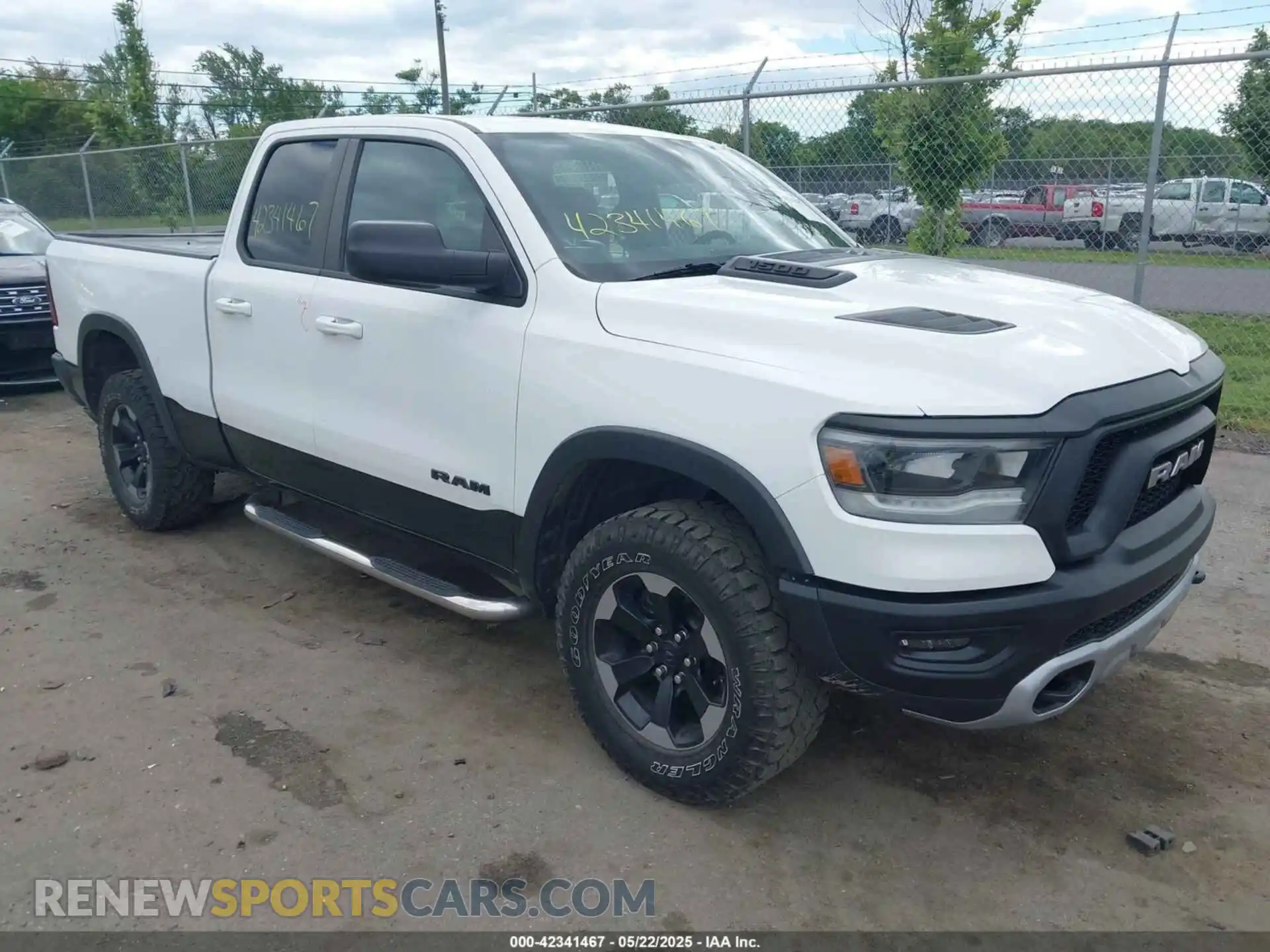 1 Photograph of a damaged car 1C6RRFEG0KN806763 RAM 1500 2019