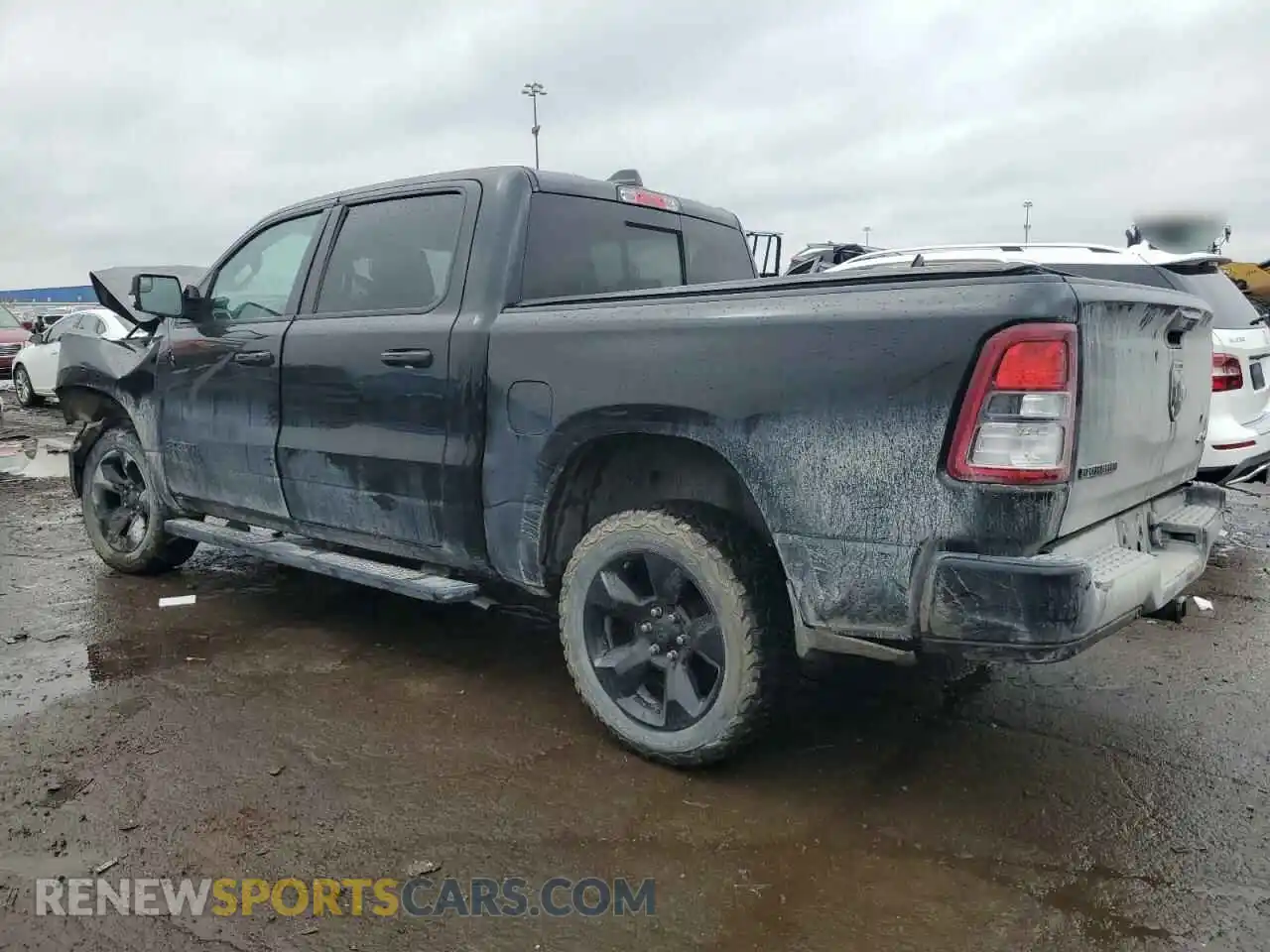 2 Photograph of a damaged car 1C6RRFFG2KN881477 RAM 1500 2019