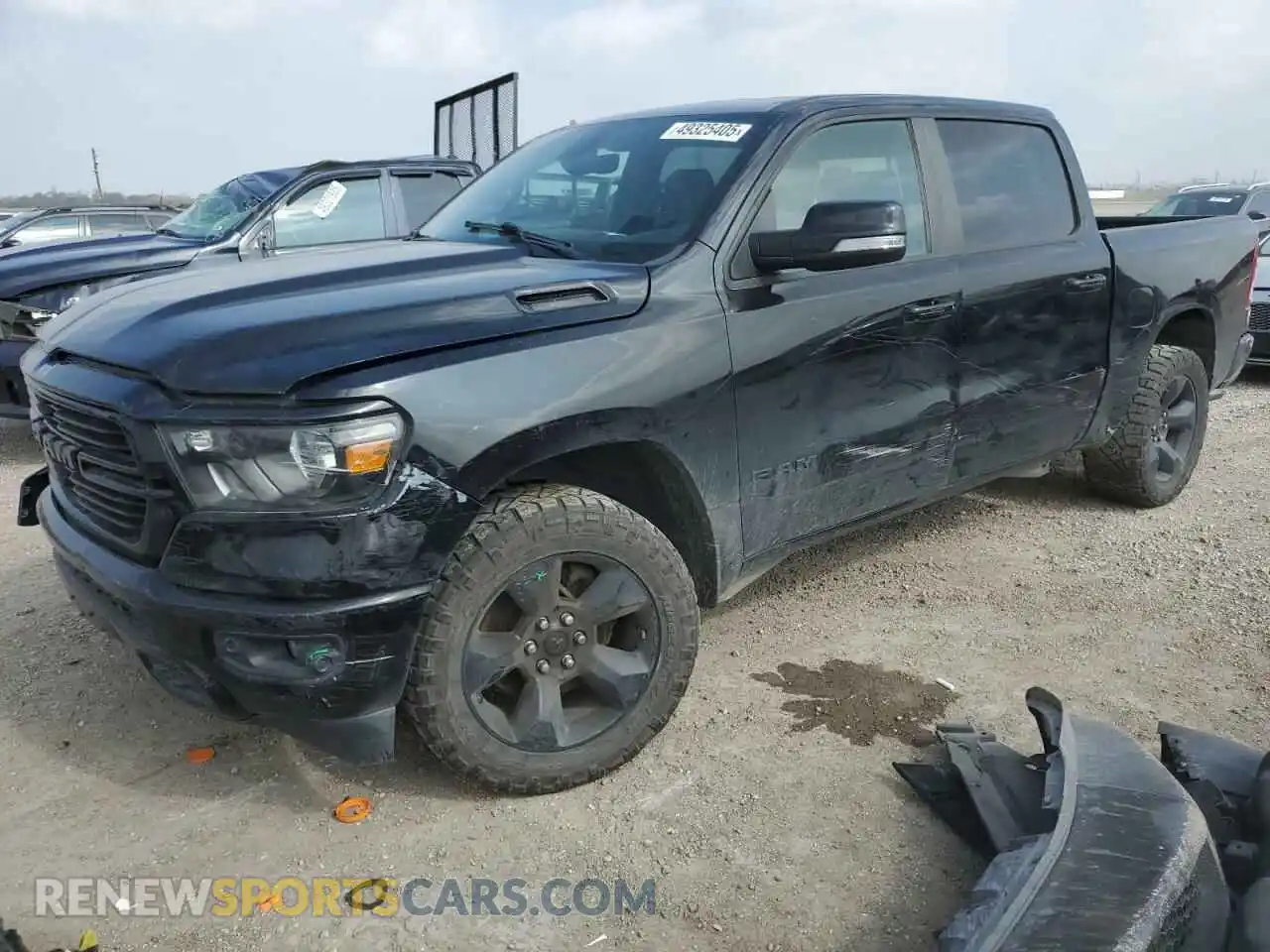 1 Photograph of a damaged car 1C6RRFFG5KN846660 RAM 1500 2019