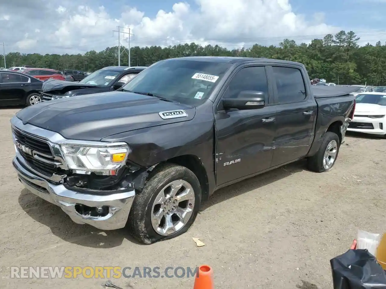 1 Photograph of a damaged car 1C6RRFFG7KN647481 RAM 1500 2019