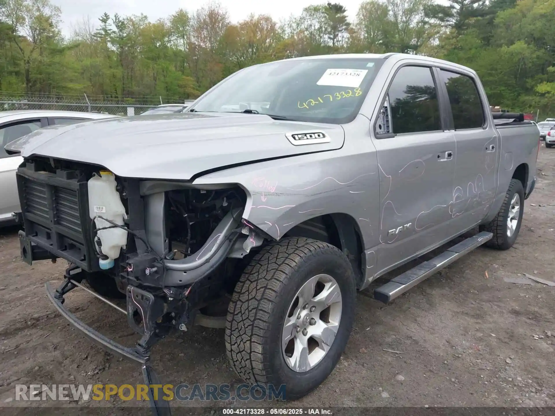 2 Photograph of a damaged car 1C6RRFFG7KN699046 RAM 1500 2019