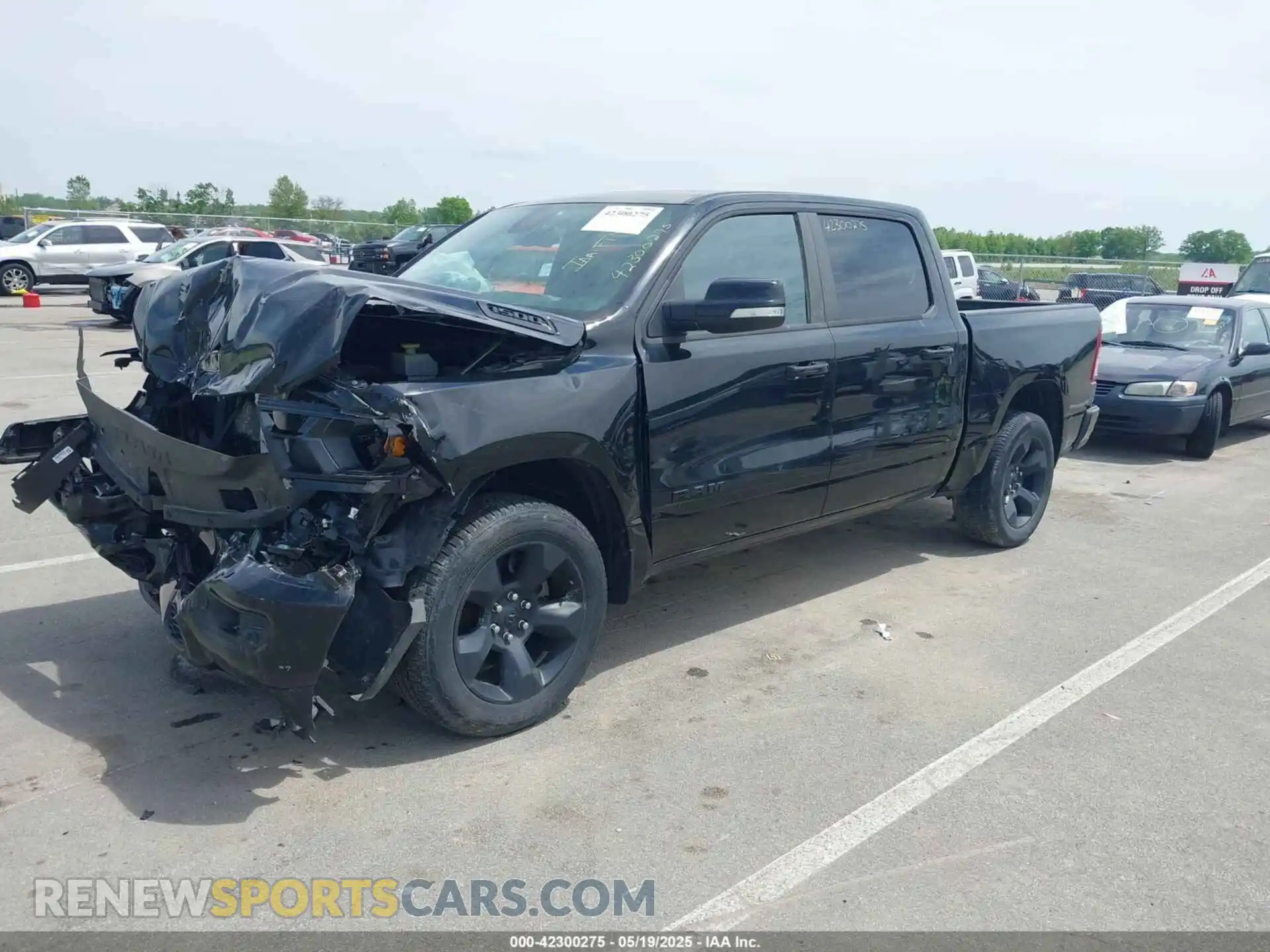 2 Photograph of a damaged car 1C6RRFFG7KN702673 RAM 1500 2019