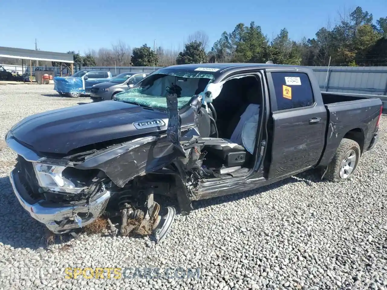 1 Photograph of a damaged car 1C6RRFFG9KN805156 RAM 1500 2019